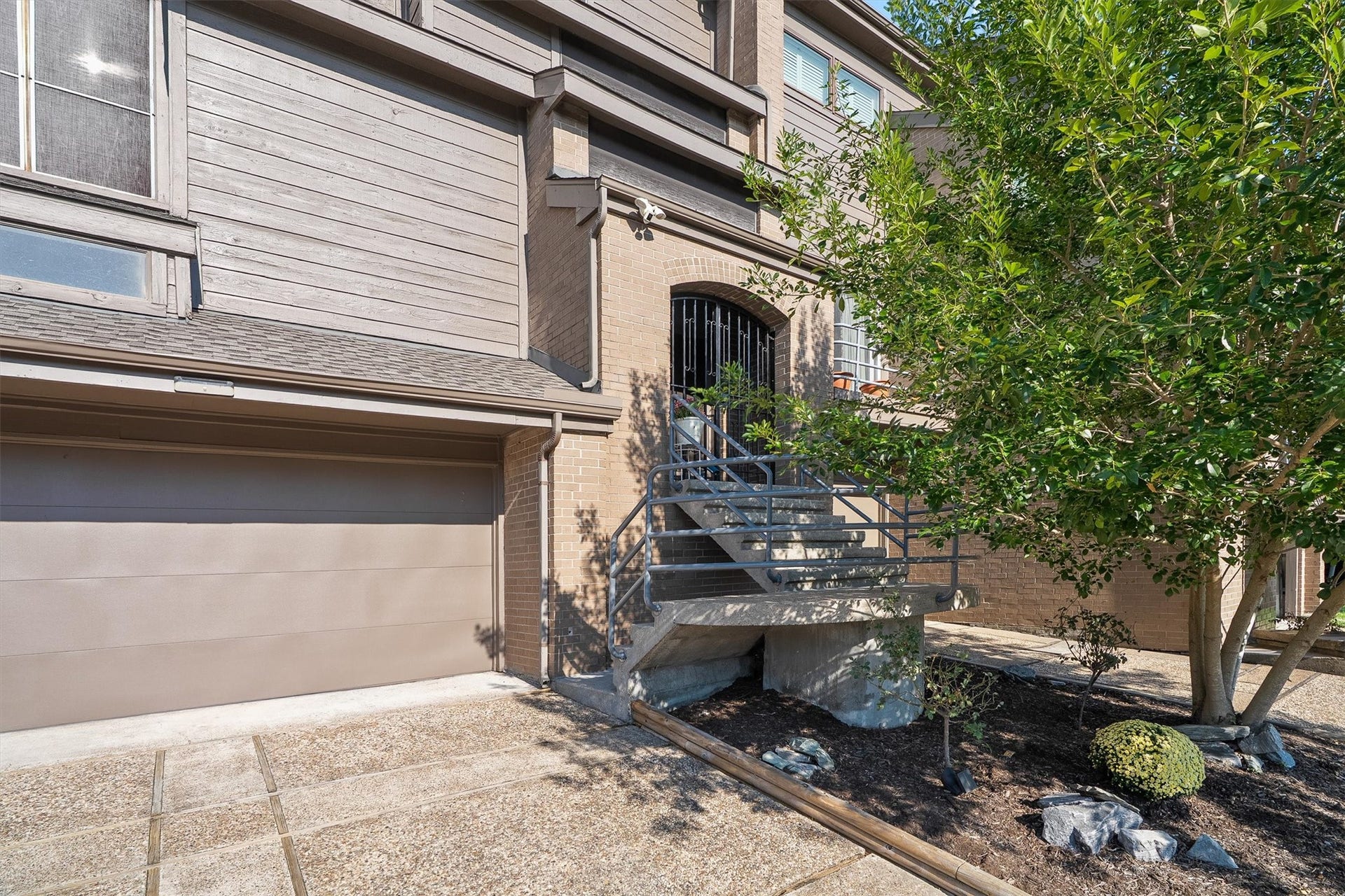 18217 Sandy Cove, Houston, TX 77058 Attached two-car garage offers parking convenience.