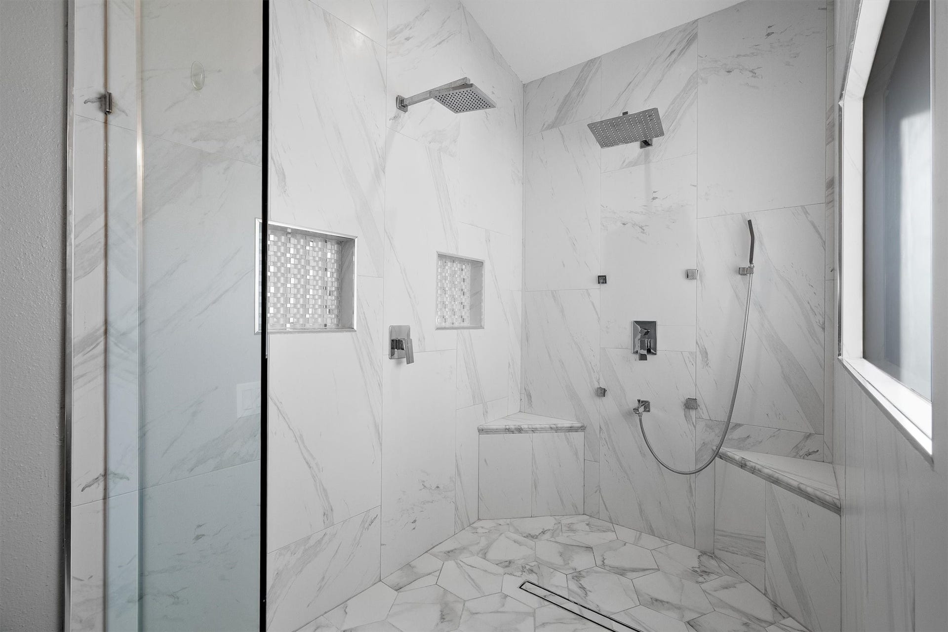 18217 Sandy Cove, Houston, TX 77058 Large walk-in glass shower with dual showerhead fixtures.