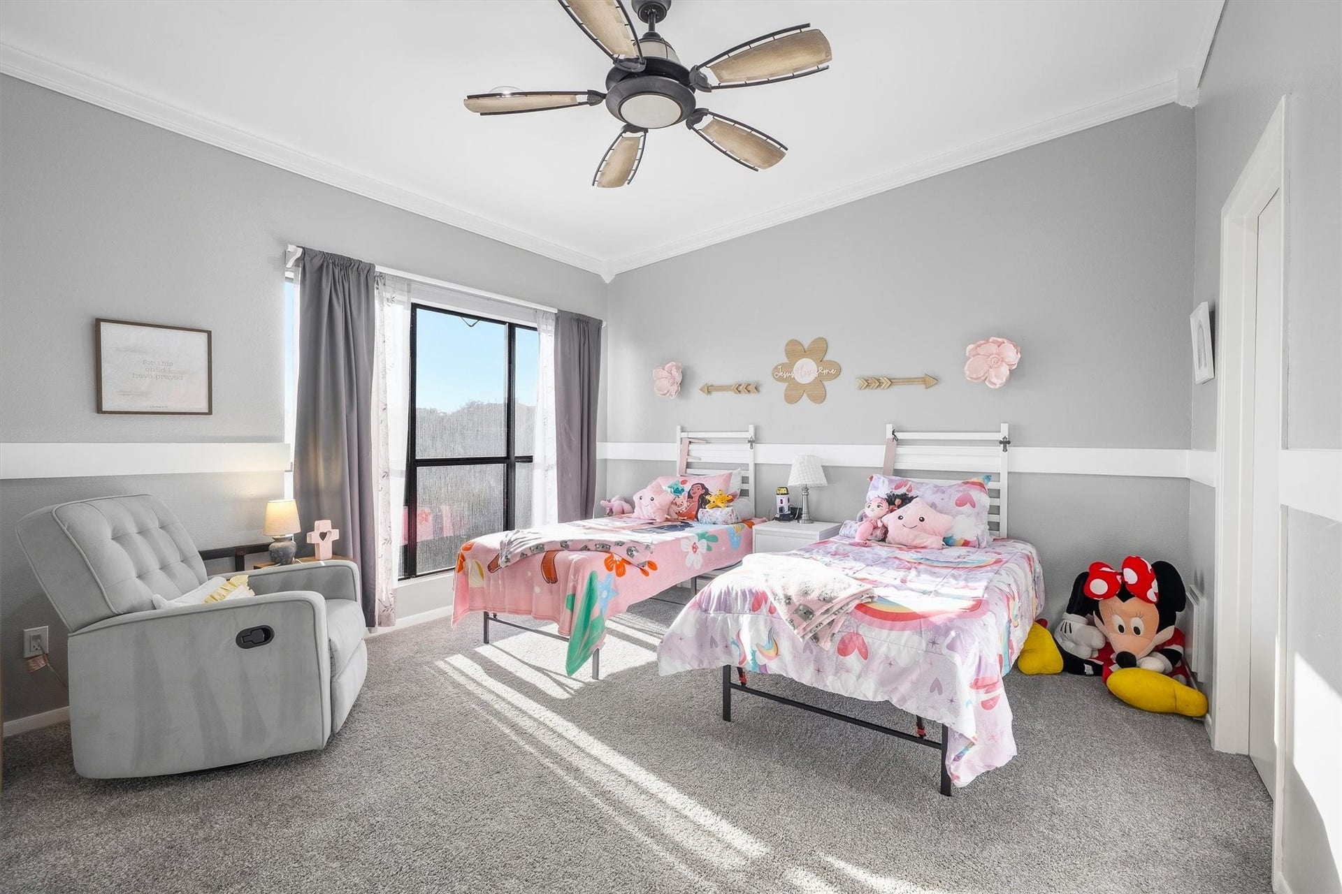 18217 Sandy Cove, Houston, TX 77058 Secondary bedroom featuring large windows and a ceiling fan.