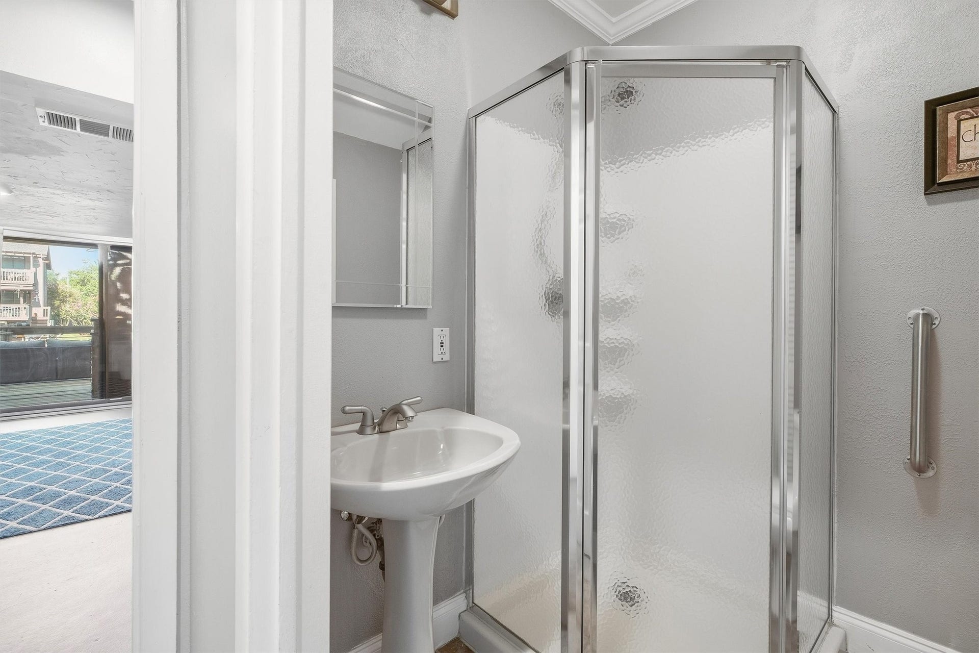 18217 Sandy Cove, Houston, TX 77058 Downstairs full bath with walk-in shower.