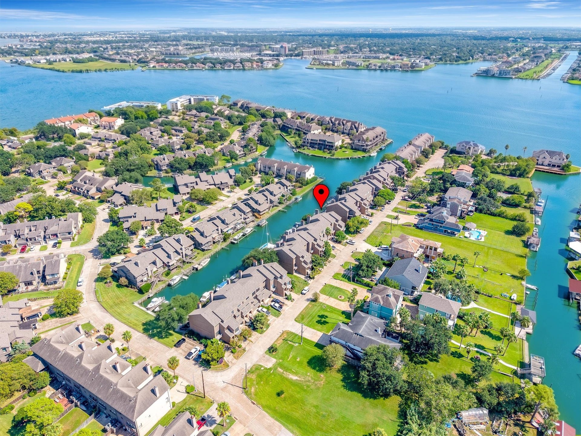 18217 Sandy Cove, Houston, TX 77058 Your turnkey waterfront haven in the heart of Bal Harbour.