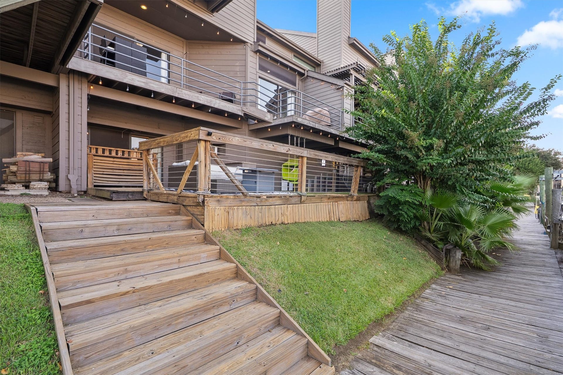 18217 Sandy Cove, Houston, TX 77058 Tranquil canal views from multiple outdoor levels.