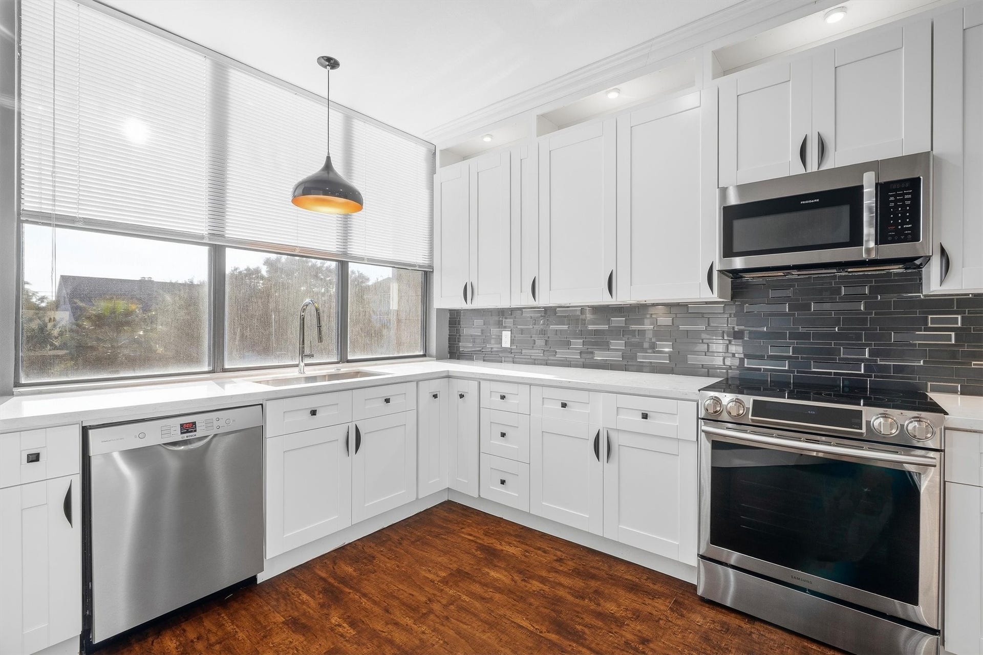 18217 Sandy Cove, Houston, TX 77058 Chef-inspired kitchen with sleek modern design elements.