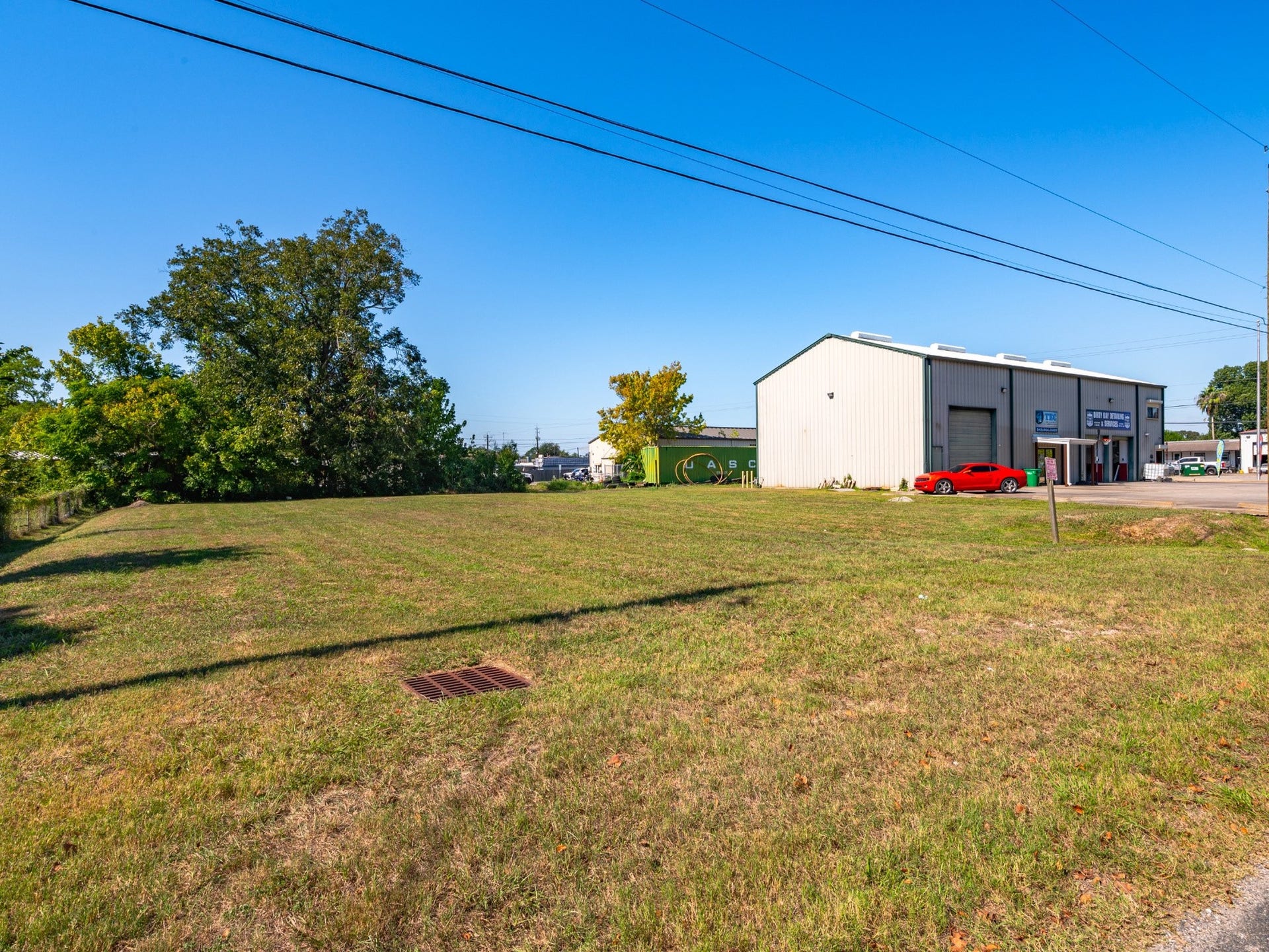 4618 11th Street, Bacliff, TX 77518 Additional ground-level perspective showing the open lot and street frontage.