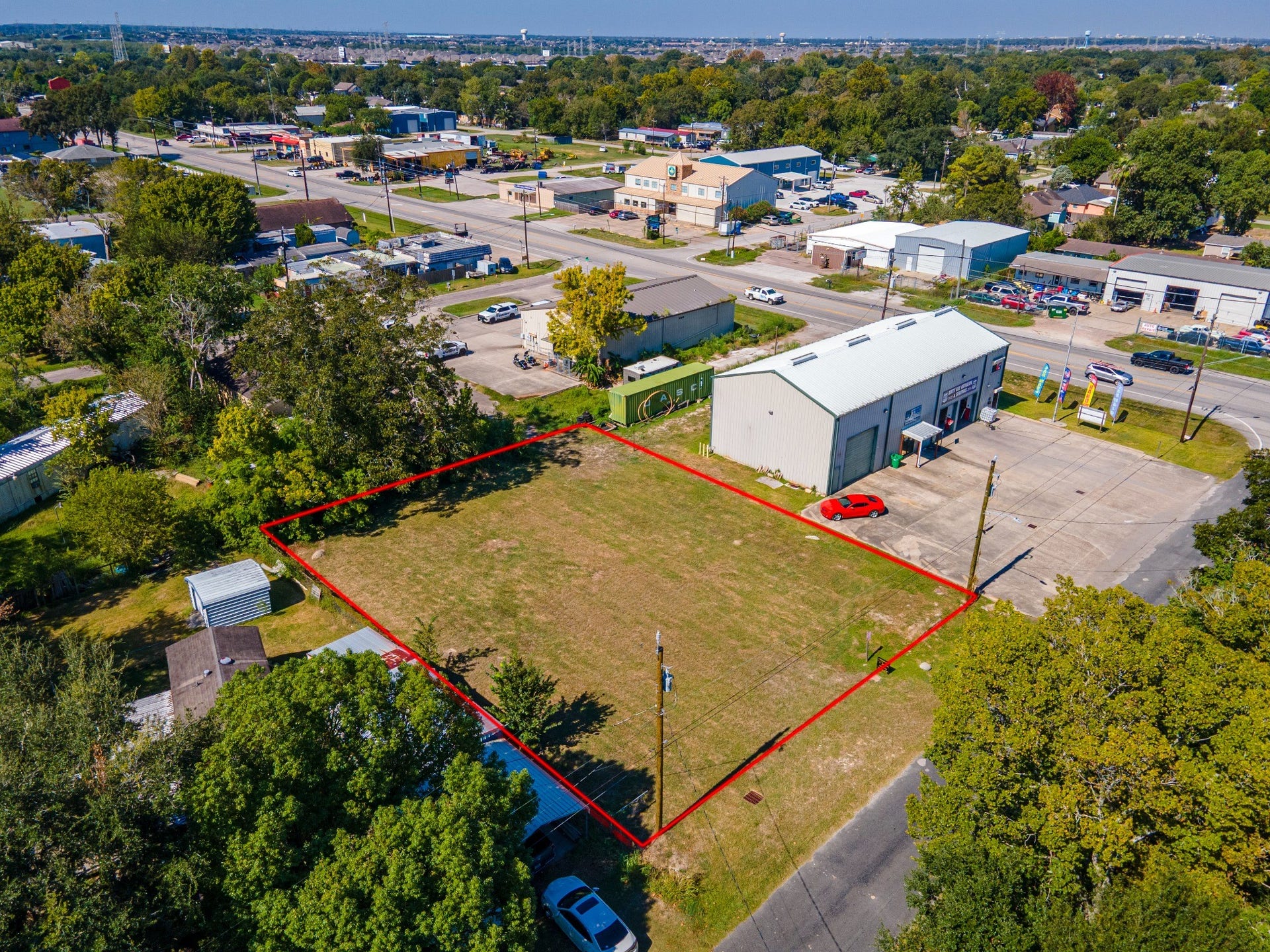 4618 11th Street, Bacliff, TX 77518 Aerial view of the open lot with approximate boundaries outlined in red.