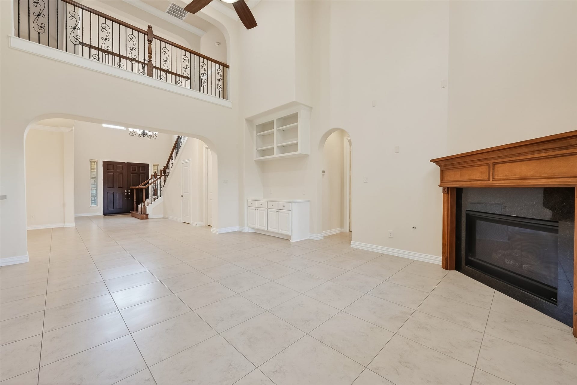14447 KINGSTON COVE Lane, Houston, TX 77077 Main Living Room offers a gas log fireplace.