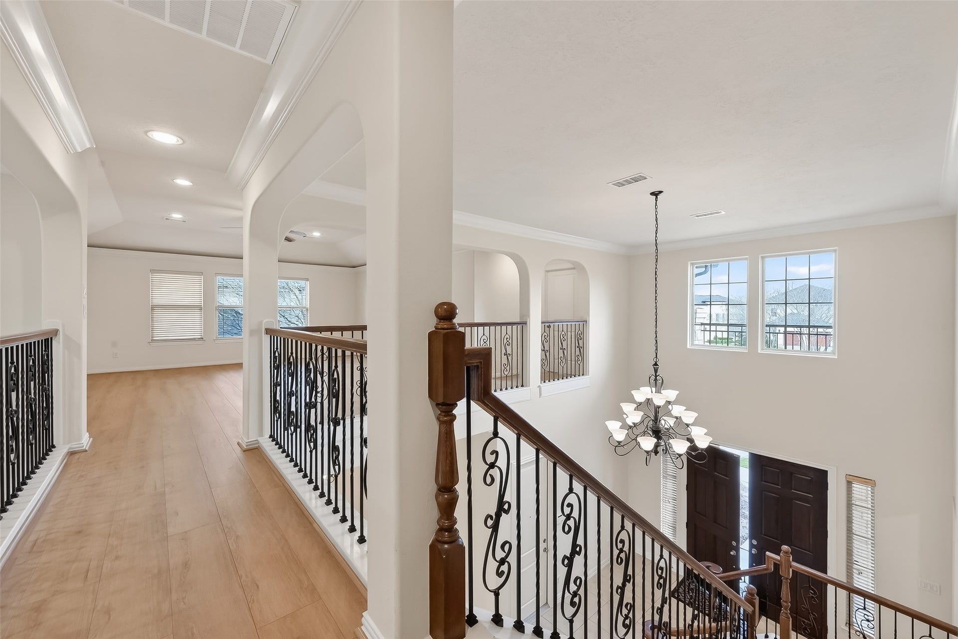 14447 KINGSTON COVE Lane, Houston, TX 77077 Second Floor Landing boasts vinyl wood flooring throughout and fresh new painted walls.