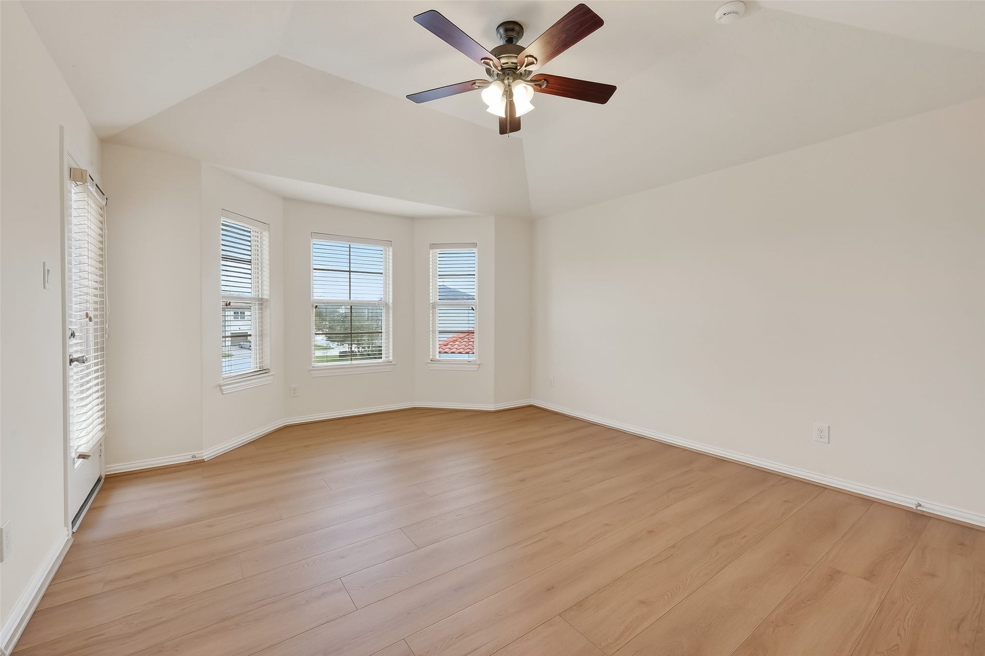 14447 KINGSTON COVE Lane, Houston, TX 77077 Secondary 1st Bedroom offers high ceilings, new paint and flooring all throughout. Great Views of the front yard with access to the front balcony.