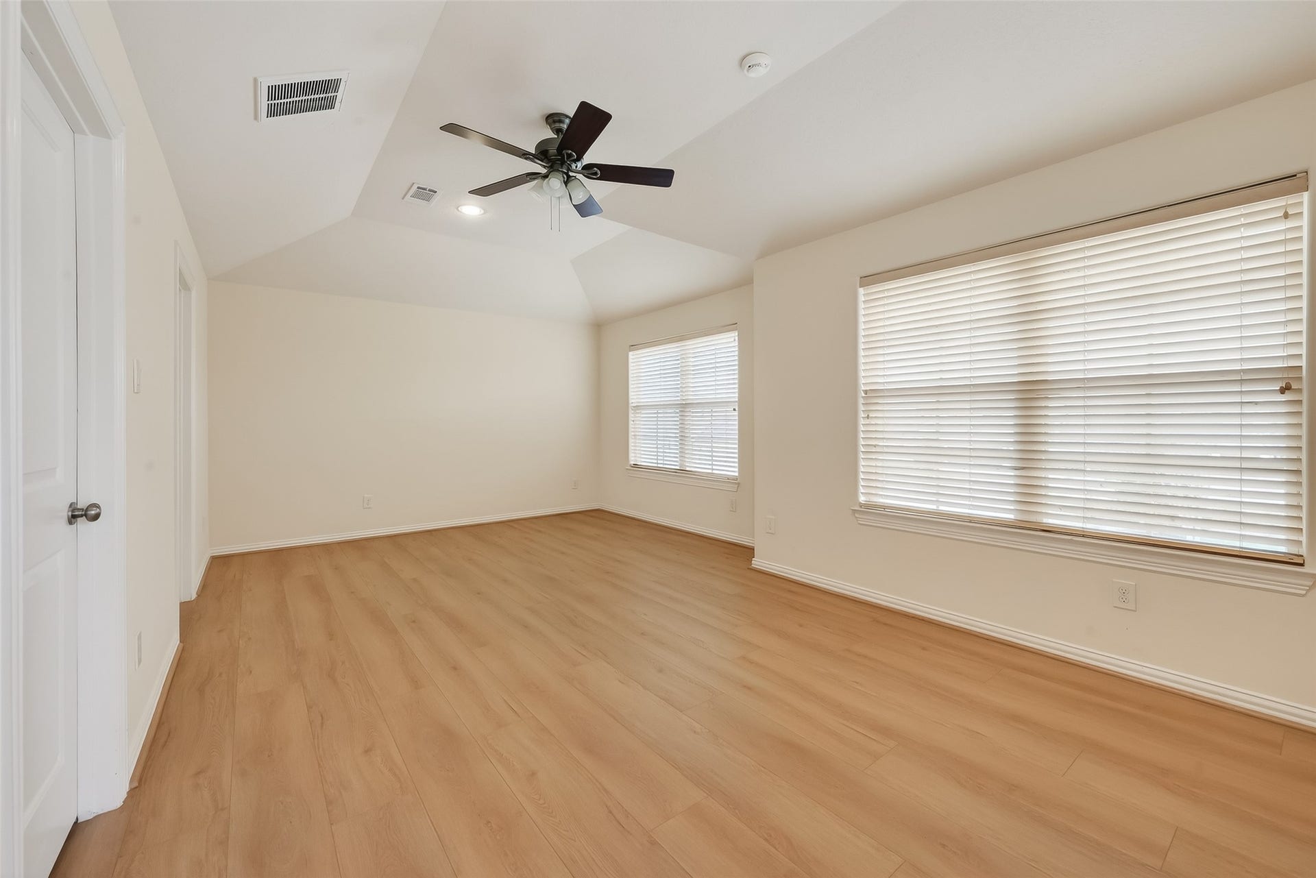 14447 KINGSTON COVE Lane, Houston, TX 77077 Spacious Fourth Bedroom with plenty of natural light, walk in closet and great views of the front yard plus access to the front balcony.