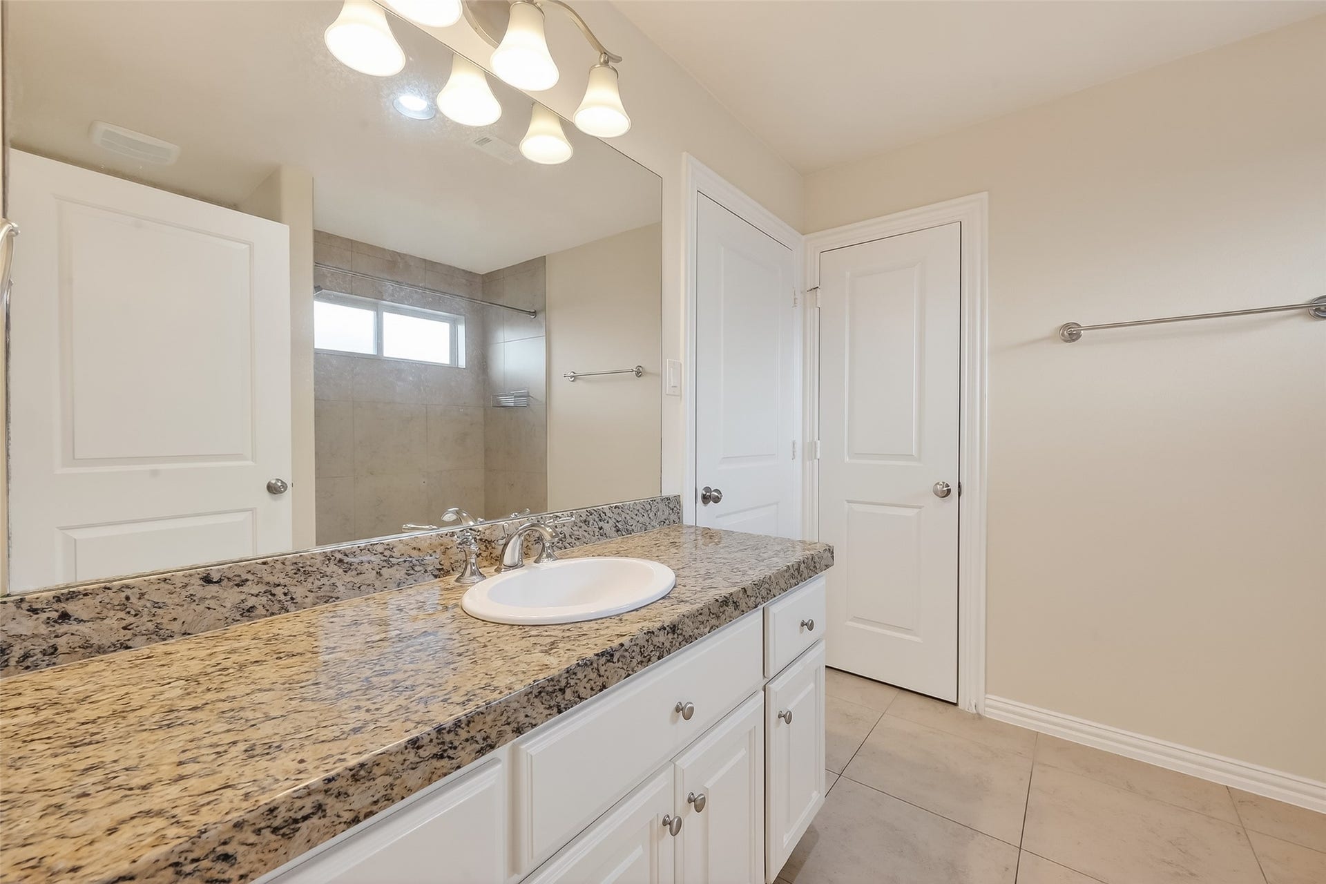 14447 KINGSTON COVE Lane, Houston, TX 77077 Secondary Bathroom shared between secondaries second and third bedroom.
