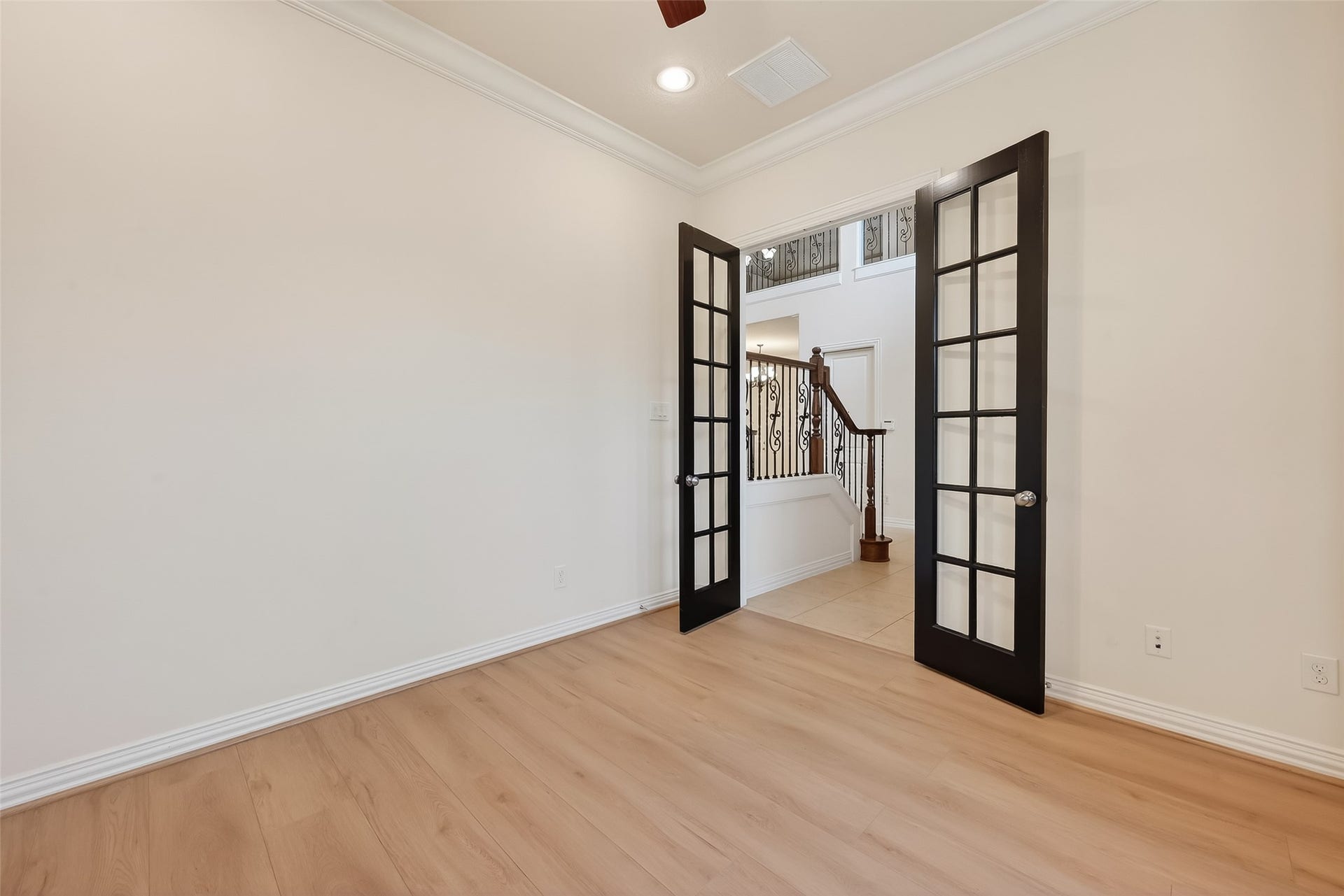 14447 KINGSTON COVE Lane, Houston, TX 77077 Fabulous Private Study offers French double doors for privacy, wood flooring and freshly painted walls.