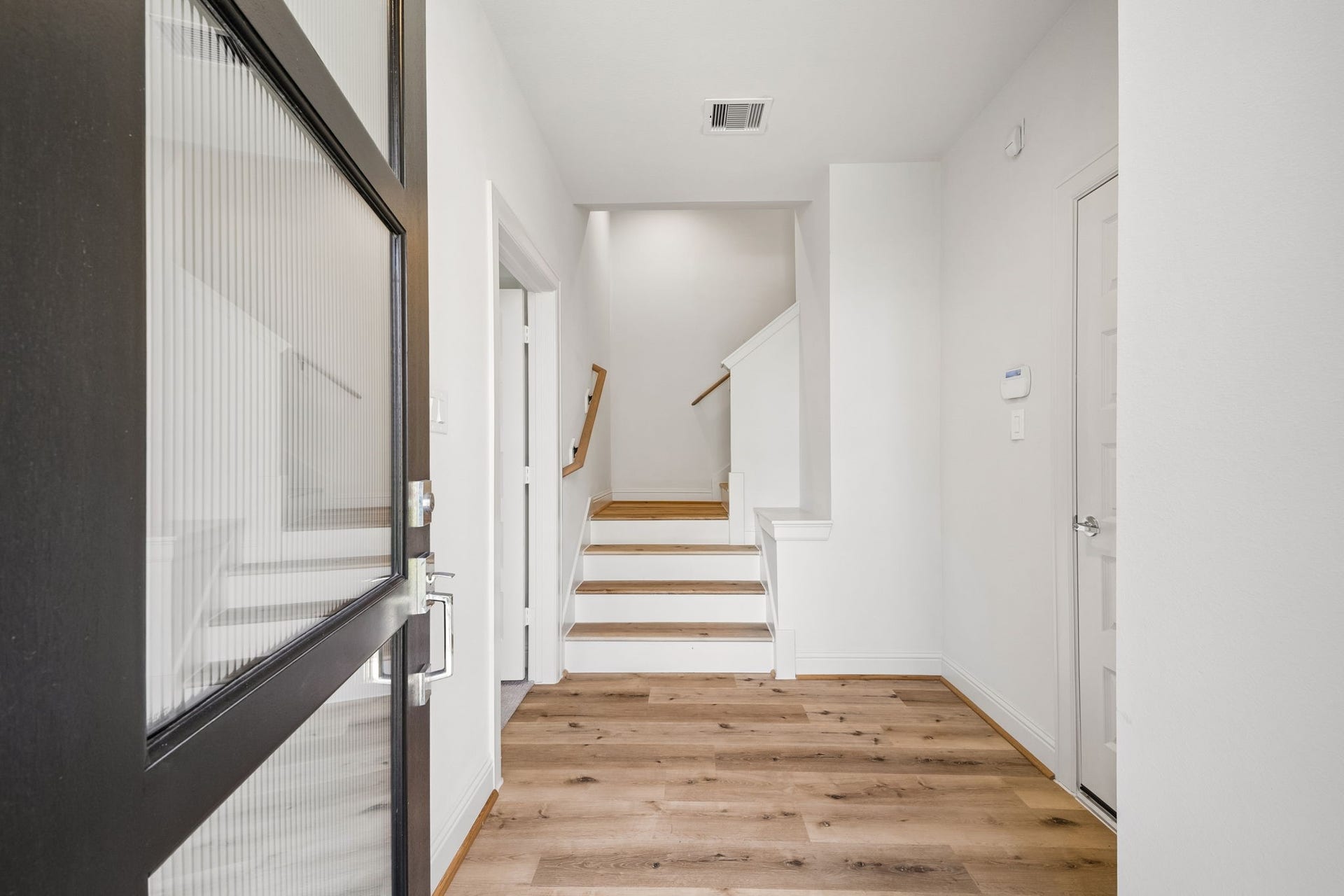 Step into a bright and inviting entrance with sleek flooring and modern finishes that set the tone for the rest of the home.