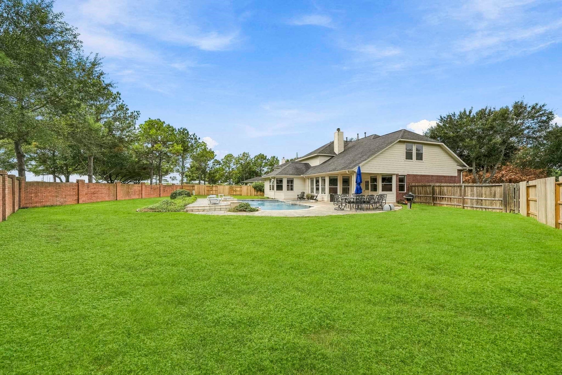 5507 Sandy Trace Court, Katy, TX 77494 Beyond the pool, discover a sprawling backyard with an abundance of open green space. The oversized cul-de-sac lot provides plenty of room for outdoor activities, play equipment, gardening, or simply enjoying the privacy of a fully fenced yard with no rear neighbors.