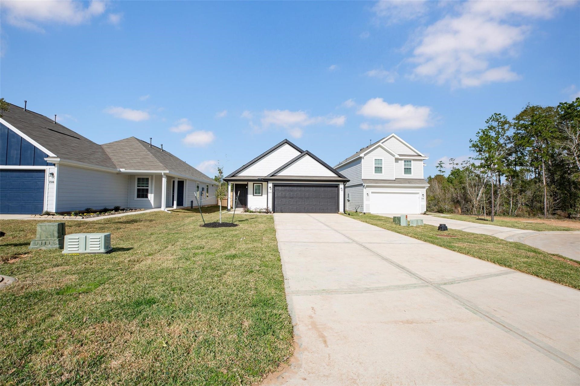 2312 Mooneye Court, Conroe, TX 77384 Four more parking spaces