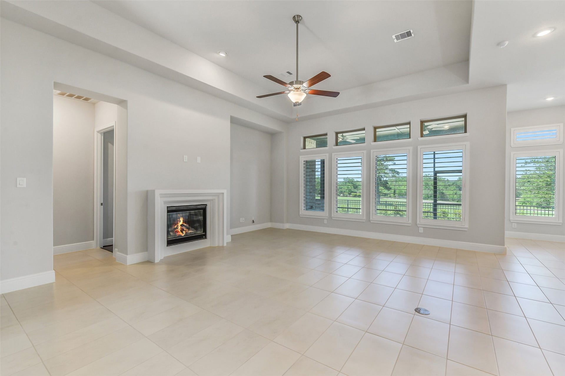 The living area has gas fireplace with a modern cast fireplace surround. There is an additional 110V outlet for TV hookup. In fact, this well planned home has six extra 110V Outlets and a floor plug in the family room.