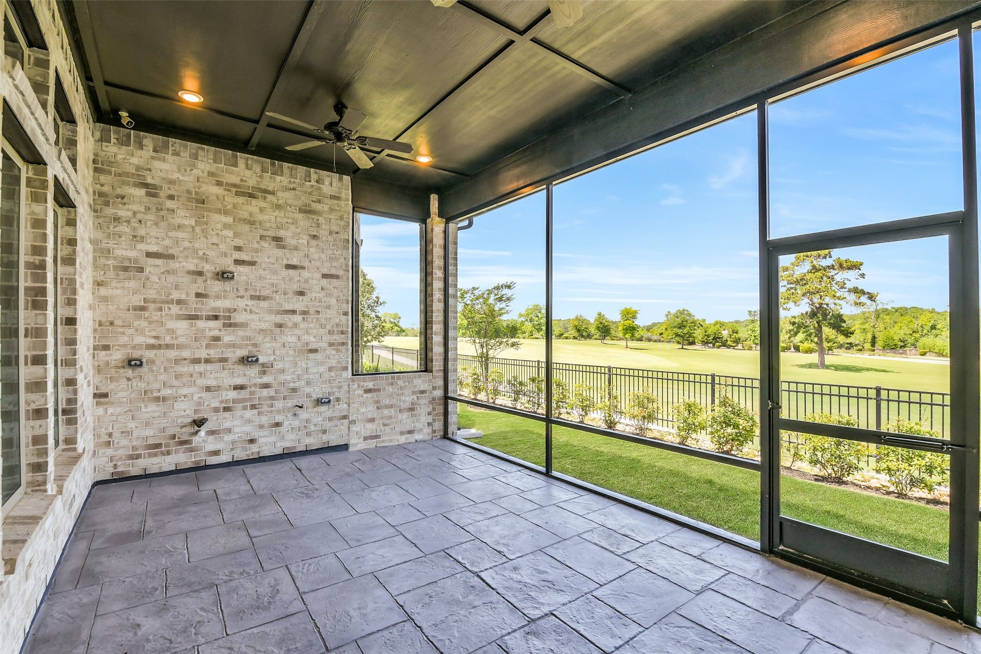 Imagine spending spare time watching the golfers tee off for Hole #4 from your Texas Covered Patio with stamped concrete. The patio has been pre plumb for outdoor kitchen and includes plumbing rough in, gas drop and 2 electrical outlets.