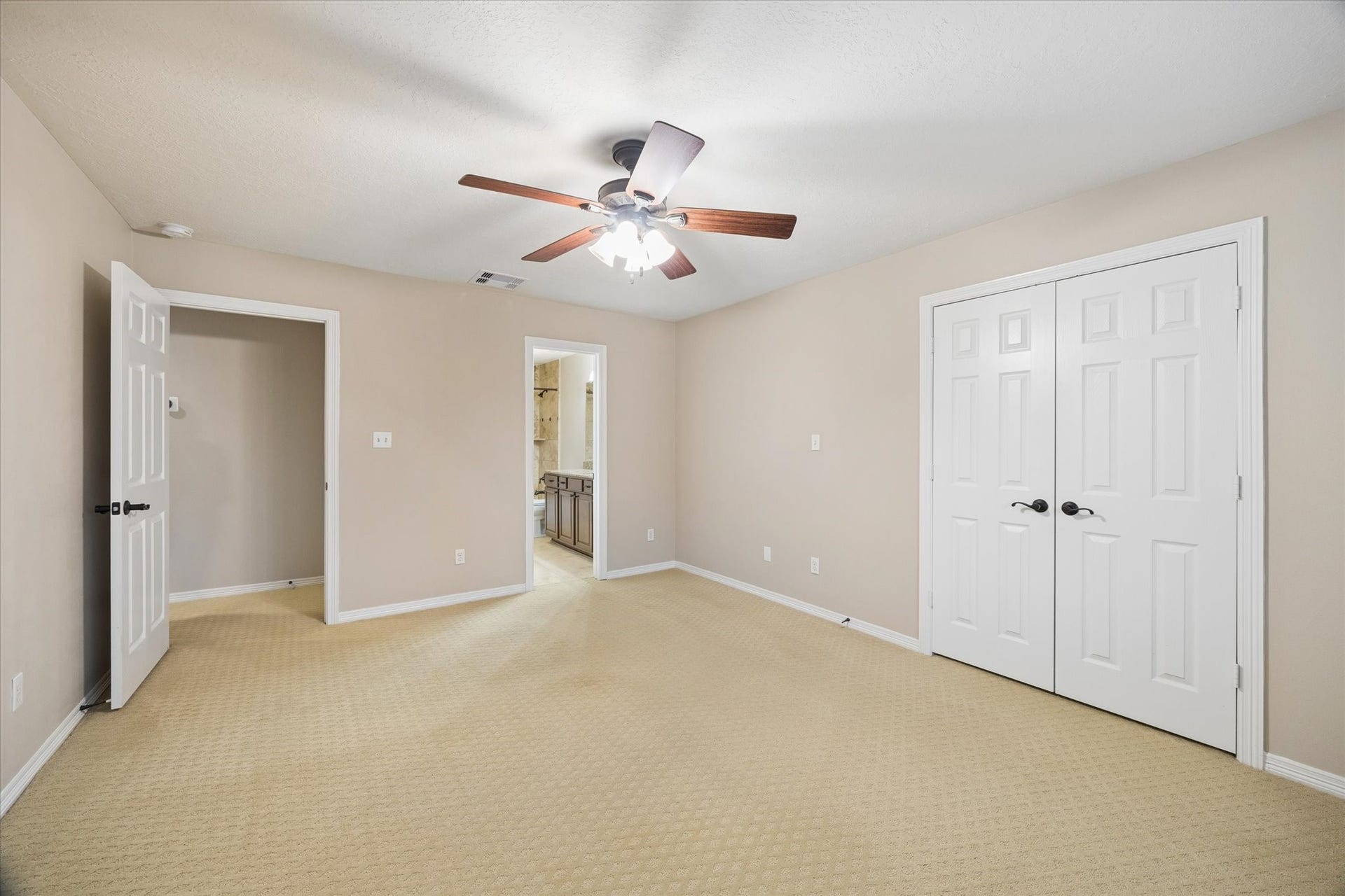24935 Waterstone Estates Circle W, Tomball, TX 77375 An exceptionally spacious second-floor secondary bedroom offers the perfect retreat for comfort and relaxation. Thoughtfully designed with generous proportions and abundant natural light, this inviting space provides plenty of room to unwind. An attached en-suite bathroom adds both privacy and convenience, making it ideal for family members or guests alike.