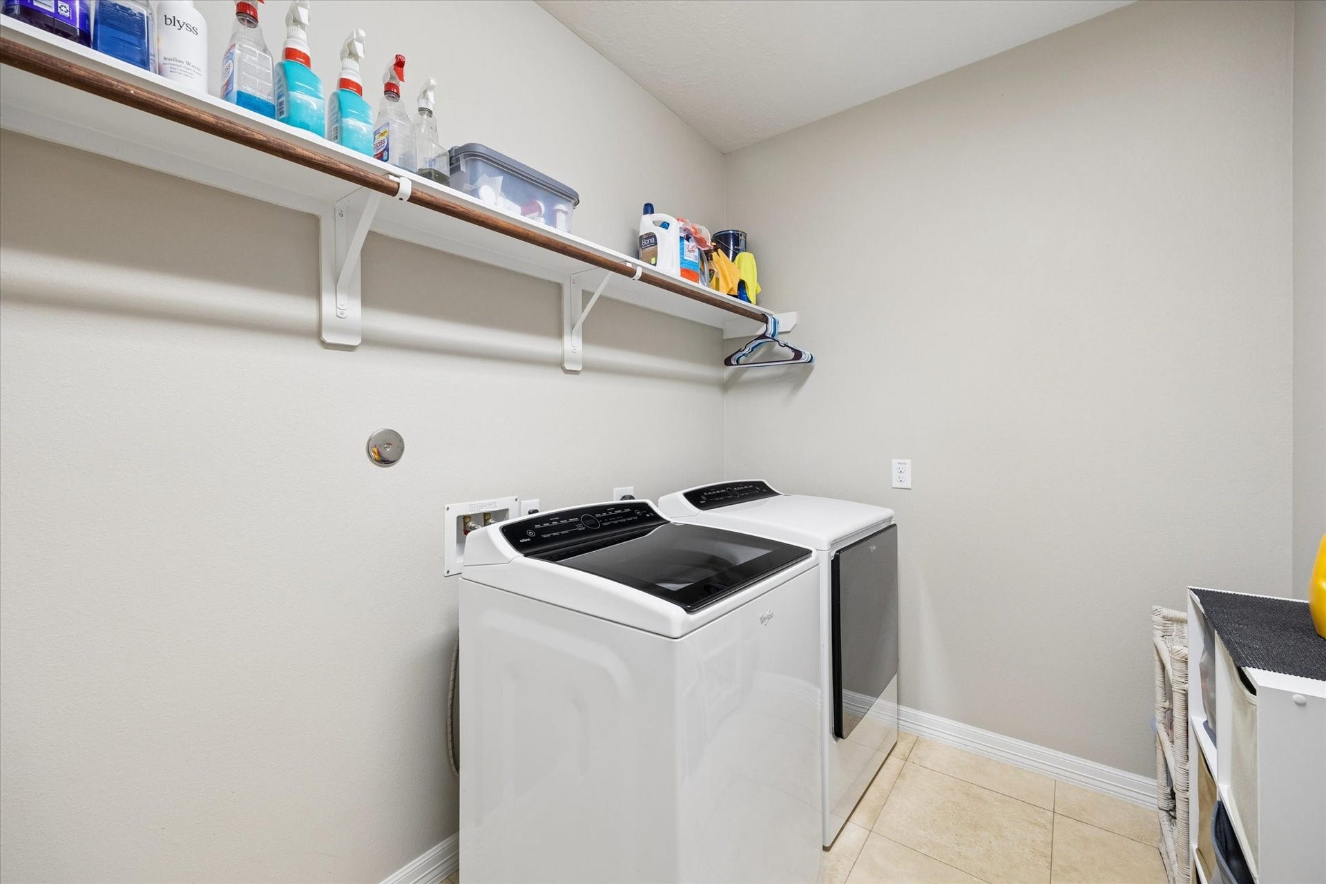 24935 Waterstone Estates Circle W, Tomball, TX 77375 Well-appointed laundry room offering generous space and practical storage for added everyday convenience.