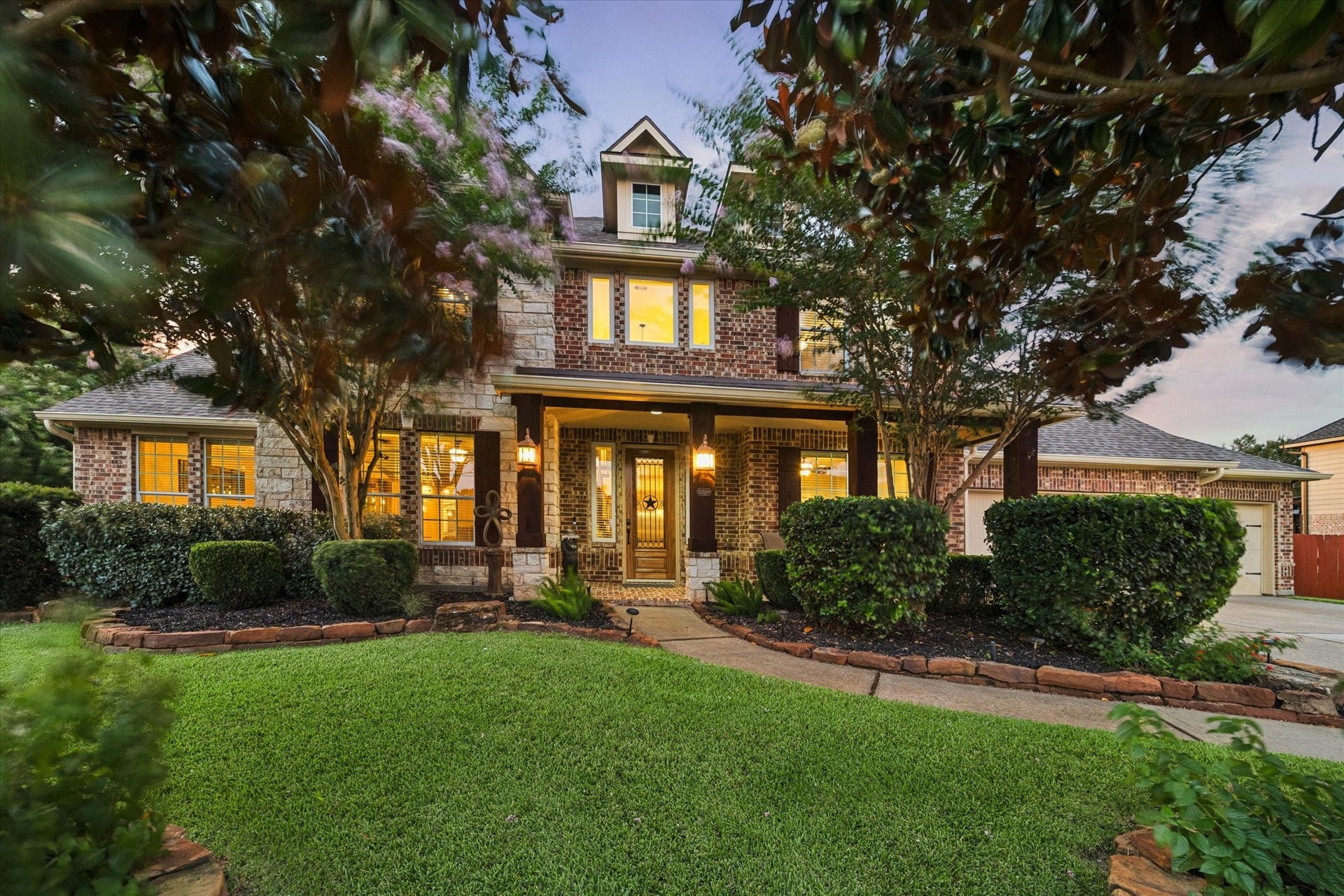 24935 Waterstone Estates Circle W, Tomball, TX 77375 Welcome Home to Waterstone Estates. A captivating first impression, where timeless architecture, mature landscaping, and lush surroundings come together to create a warm and elegant welcome to this exceptional residence.