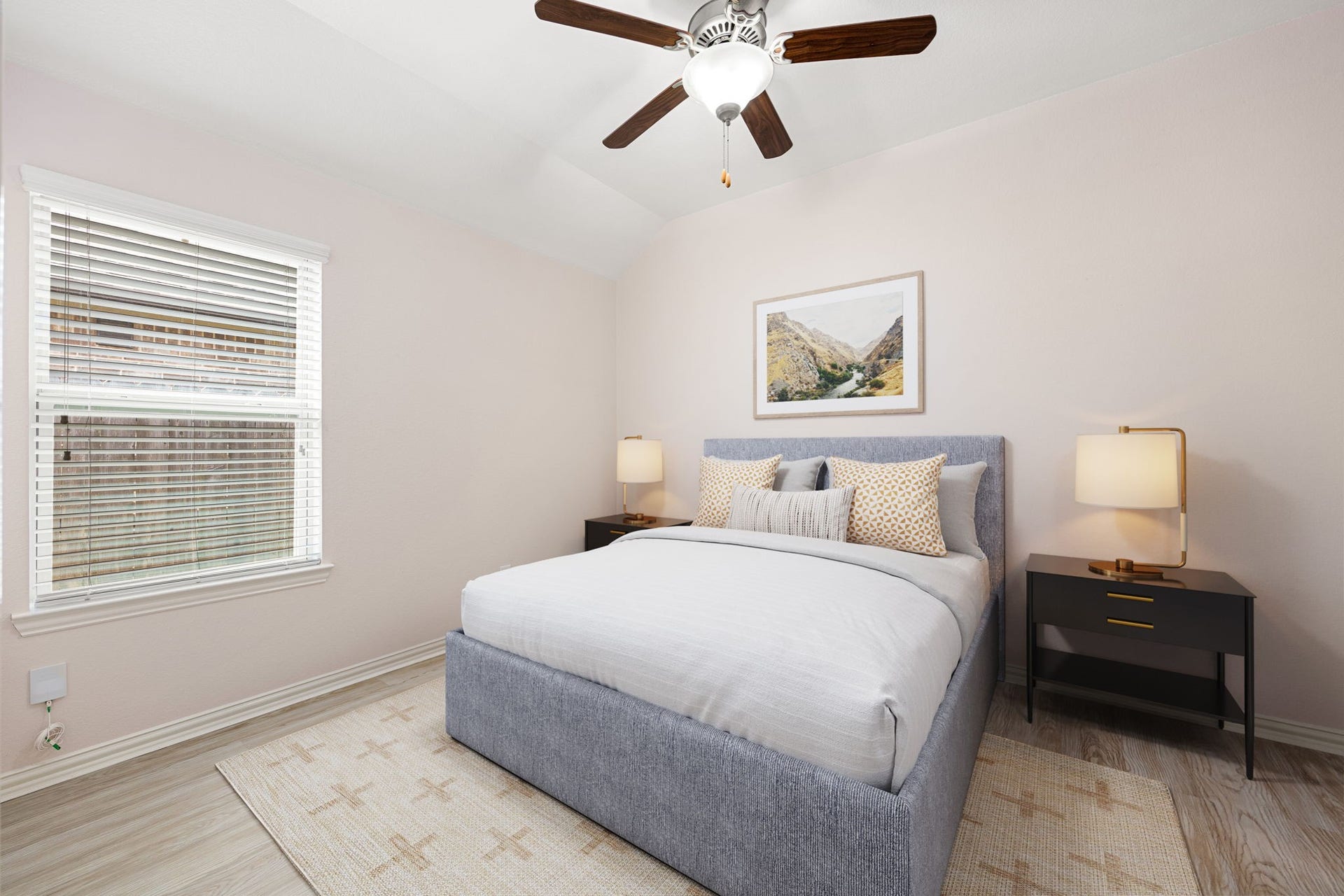 A bright and inviting secondary bedroom boasting clean lines, a vaulted ceiling detail, and durable flooringperfect for a guest room, nursery, or kids' bedroom. *Virtually Staged