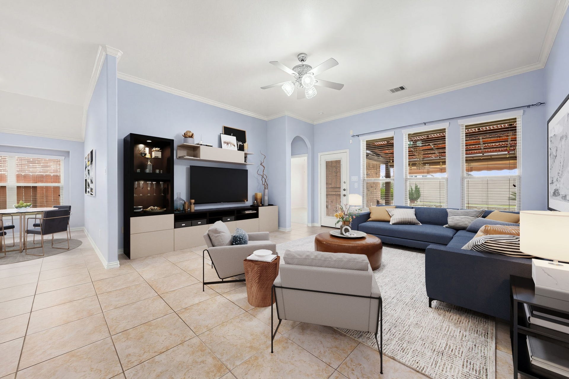 Another view of the spacious family room, showcasing the open-concept layout that flows effortlessly into the adjacent breakfast nook and kitchen areas. *Virtually Staged