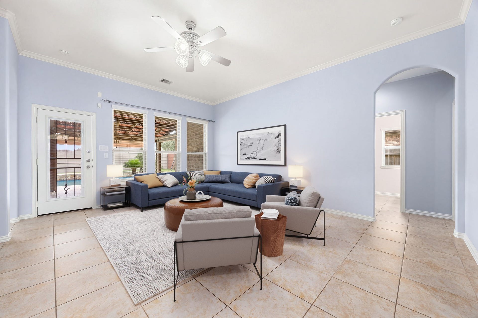 Step into a bright, open living space designed for comfort. This beautiful family room offers ample space for hosting and direct access to the private backyard. *Virtually Staged