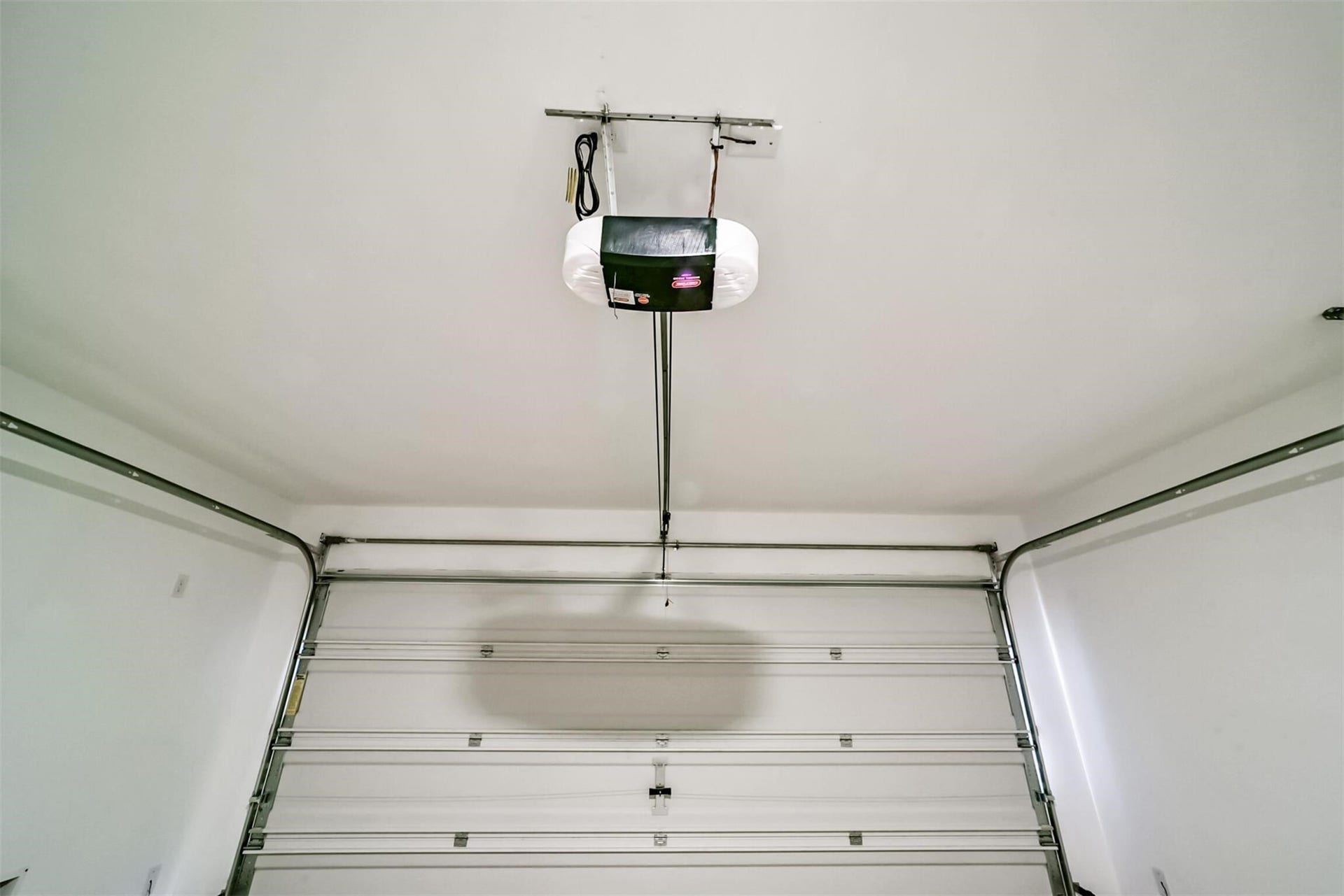 Great sized two-car garage offering plenty of parking and storage space, equipped with an automatic garage door opener.