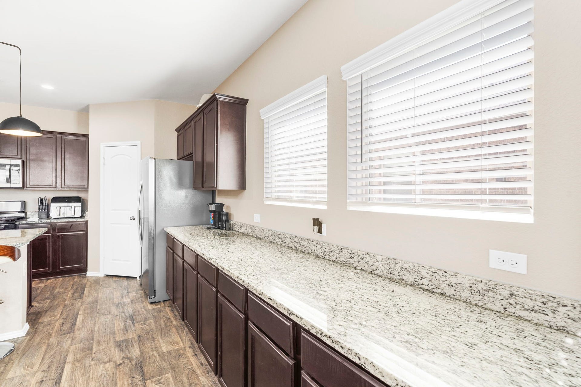 22624 Theodoli Drive, Katy, TX 77449 The built-in buffet adds both style and functionality, providing extra storage and a perfect spot for serving meals or displaying dcor.