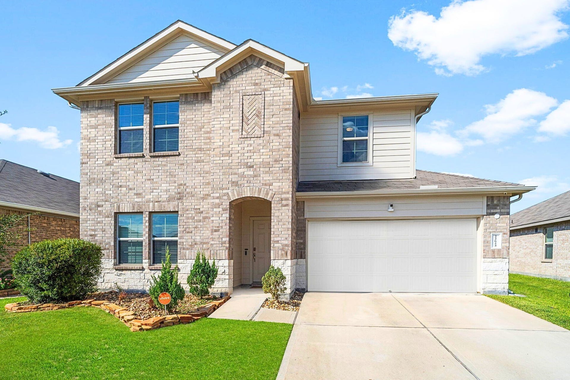 22624 Theodoli Drive, Katy, TX 77449 Welcome Home! A mix of brick and stone gives the home a classic look, while the well-kept lawn adds a warm, inviting feel.