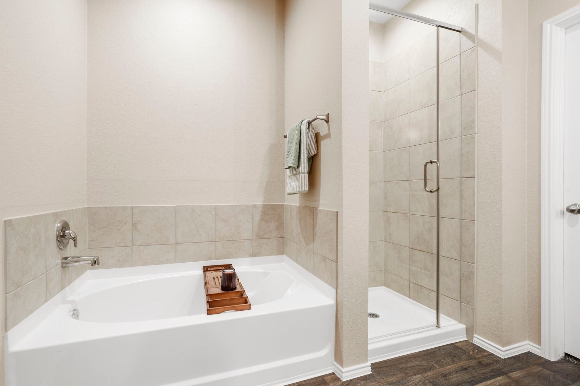 22624 Theodoli Drive, Katy, TX 77449 Relax in the deep soaking tub or start your day refreshed in the glass-enclosed shower. Dual sinks and a separate vanity area make the primary ensuite both functional and stylish.