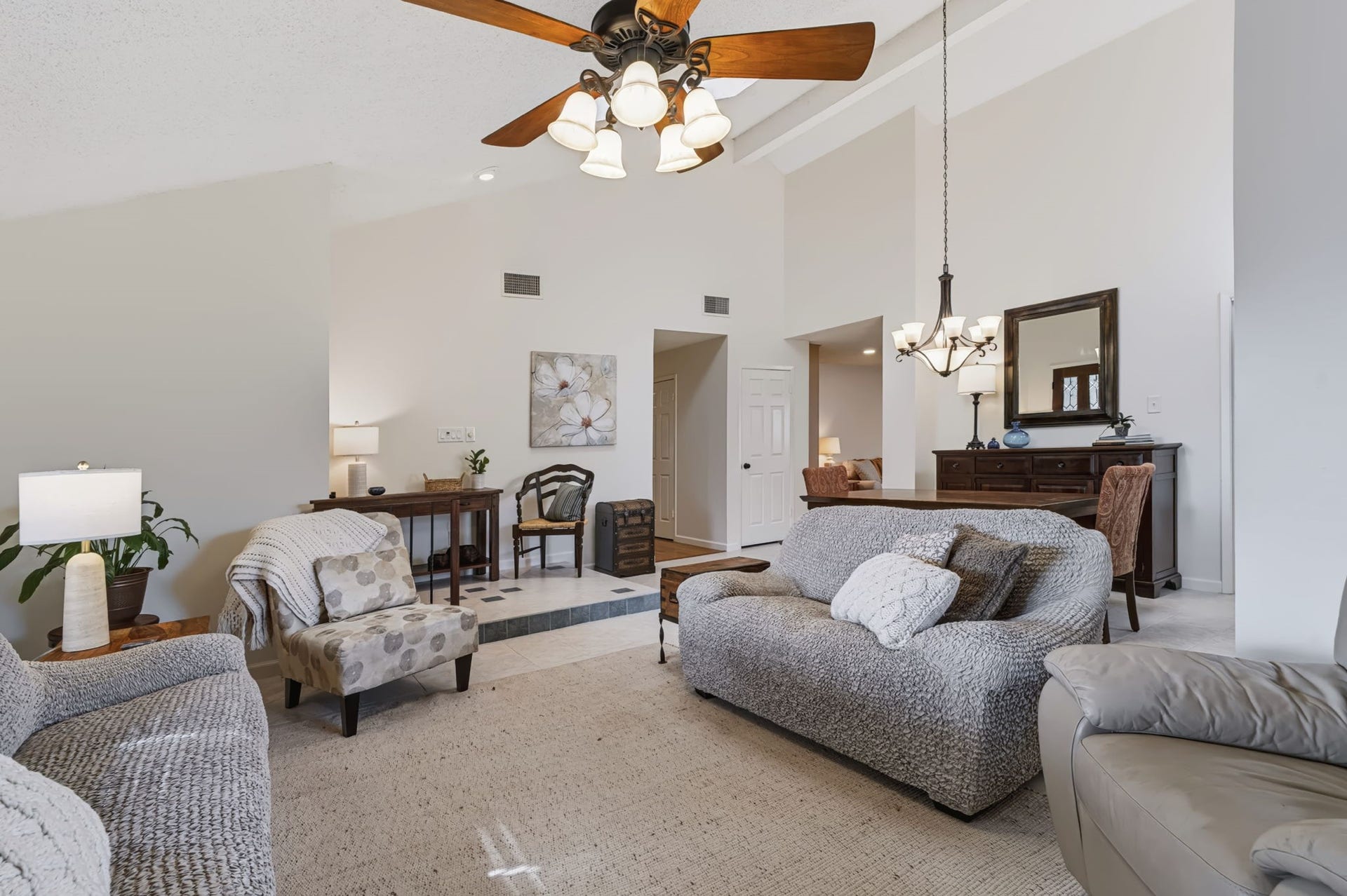 1802 Brushy Creek Drive, Sugar Land, TX 77478 The open flow between the living and dining rooms creates a seamless, spacious layout.