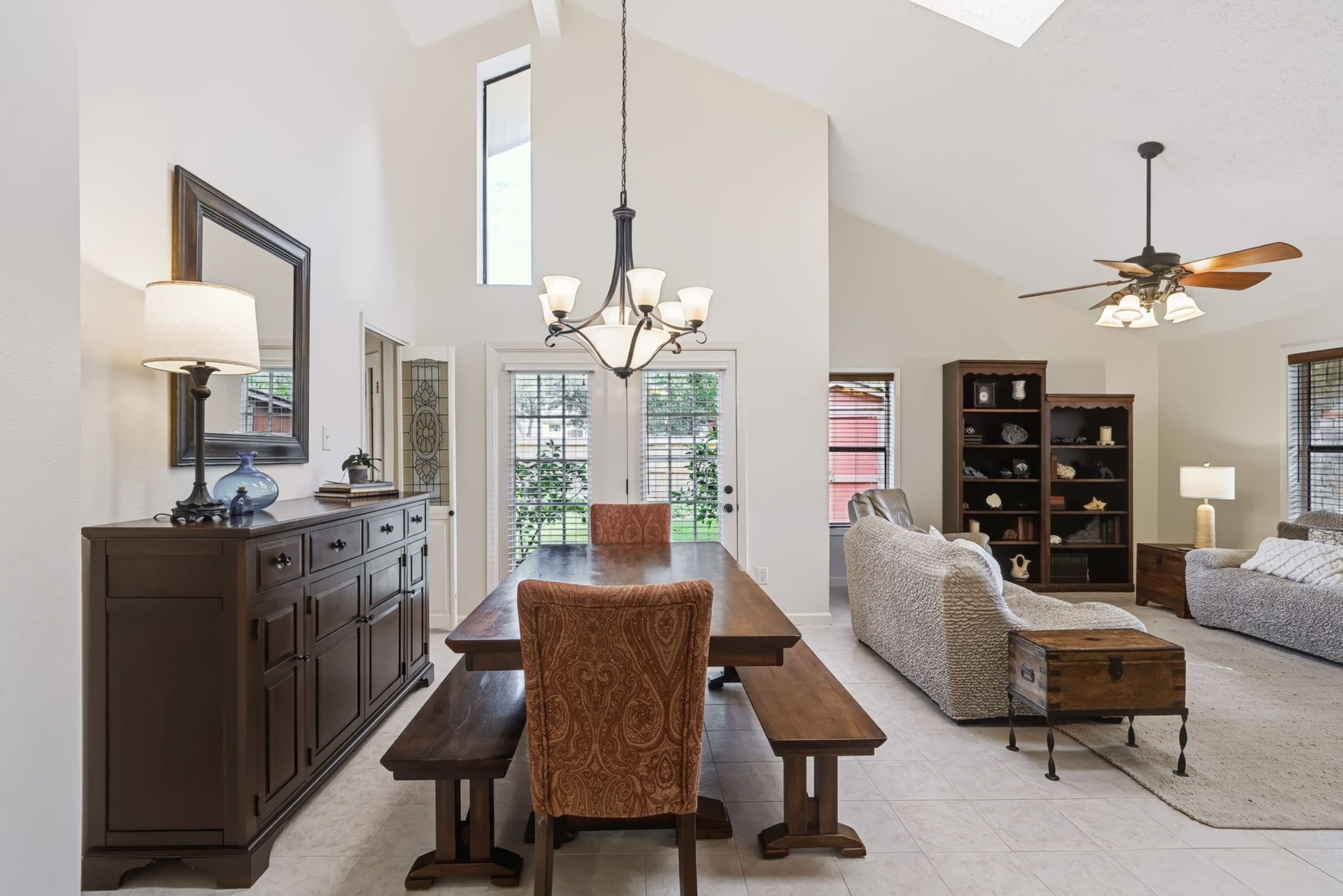 1802 Brushy Creek Drive, Sugar Land, TX 77478 Soaring vaulted ceilings, skylights, and clerestory windows create a bright, open, and airy atmosphere, filling the home with natural light.
