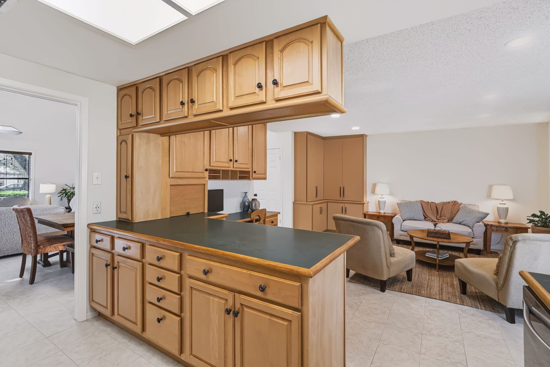 1802 Brushy Creek Drive, Sugar Land, TX 77478 Centrally positioned between the dining room and family room, the kitchen serves as the heart of the home, offering an open, connected layout ideal for everyday living and entertaining.