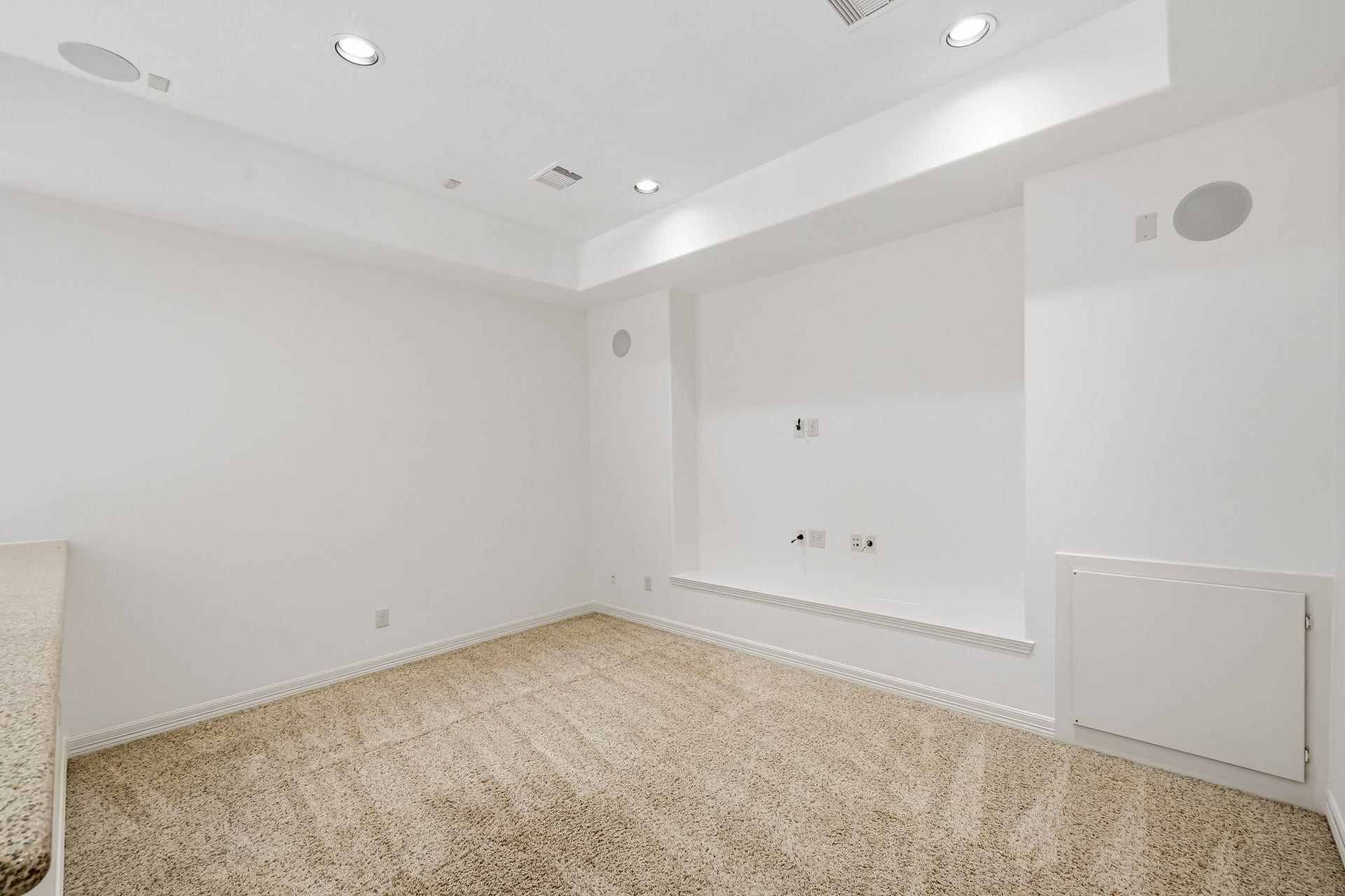 27730 Dalton Bluff Court, Katy, TX 77494 Plush carpeting, recessed lighting, built-in ceiling speakers, and pre-wired media connections make it well suited for a large-screen TV and surround-sound setup, while neutral finishes provide a versatile backdrop for customization.