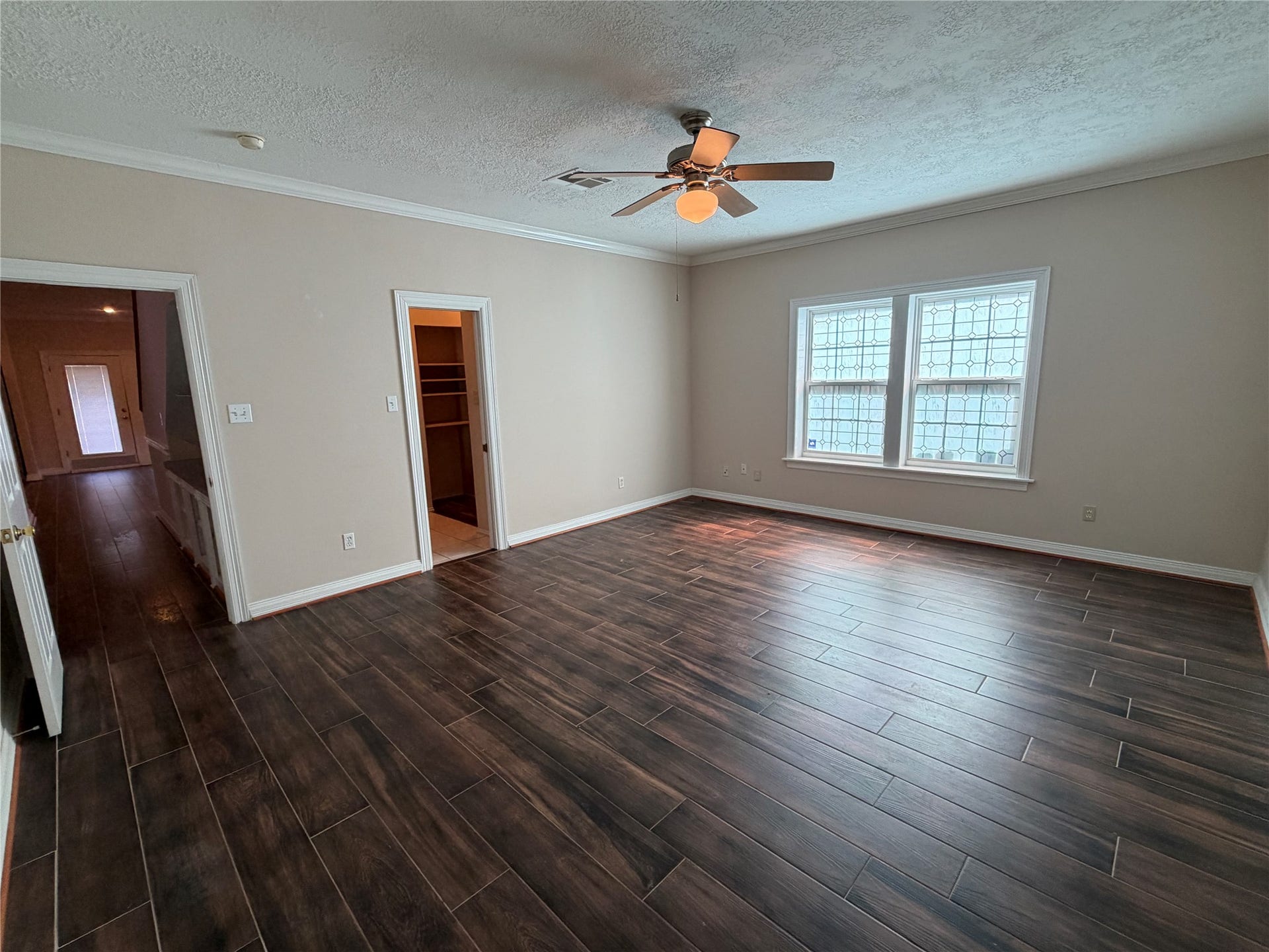 The primary bedroom is conveniently located on the first floor.