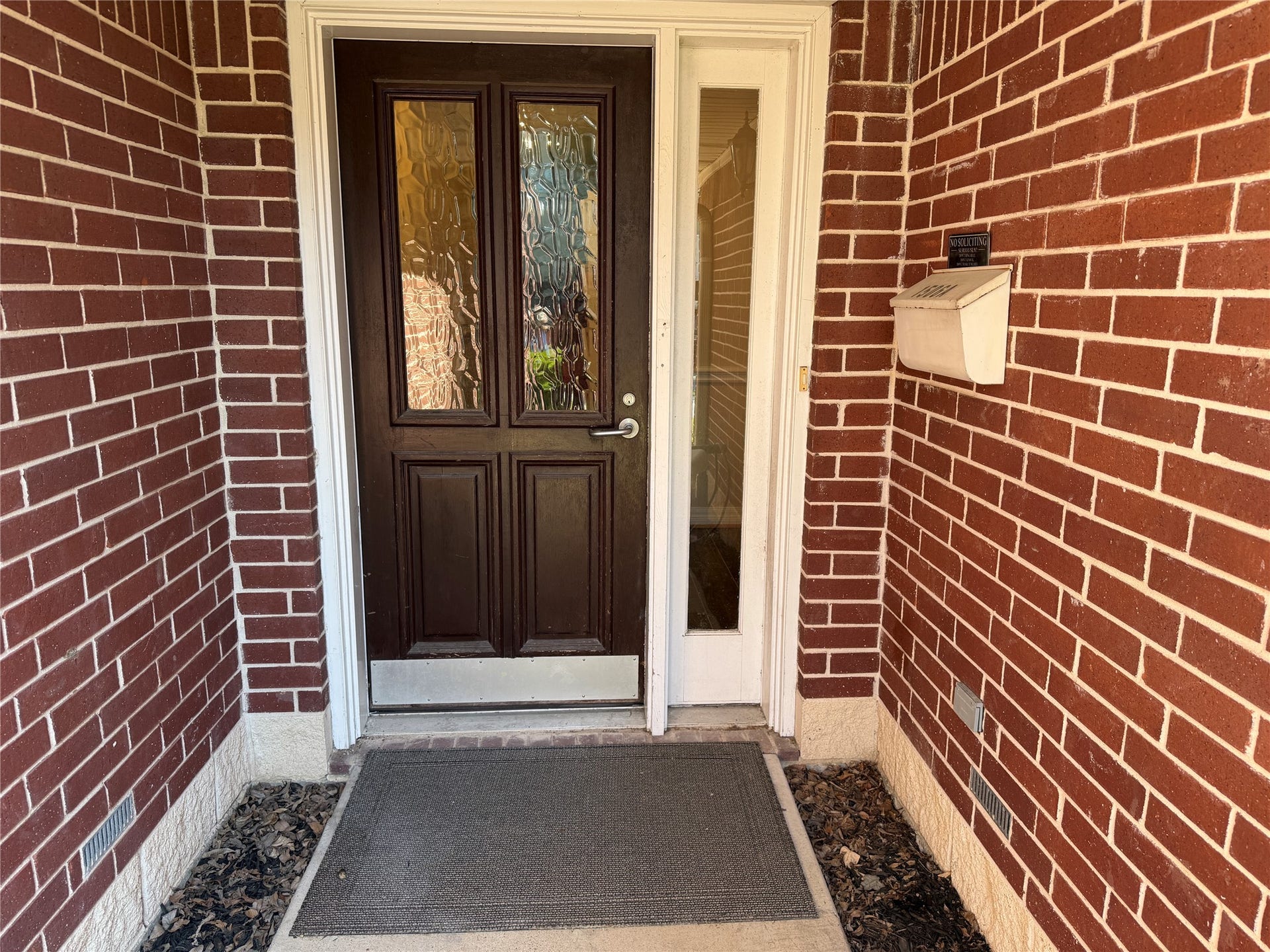 Beautiful front door and covered entry.