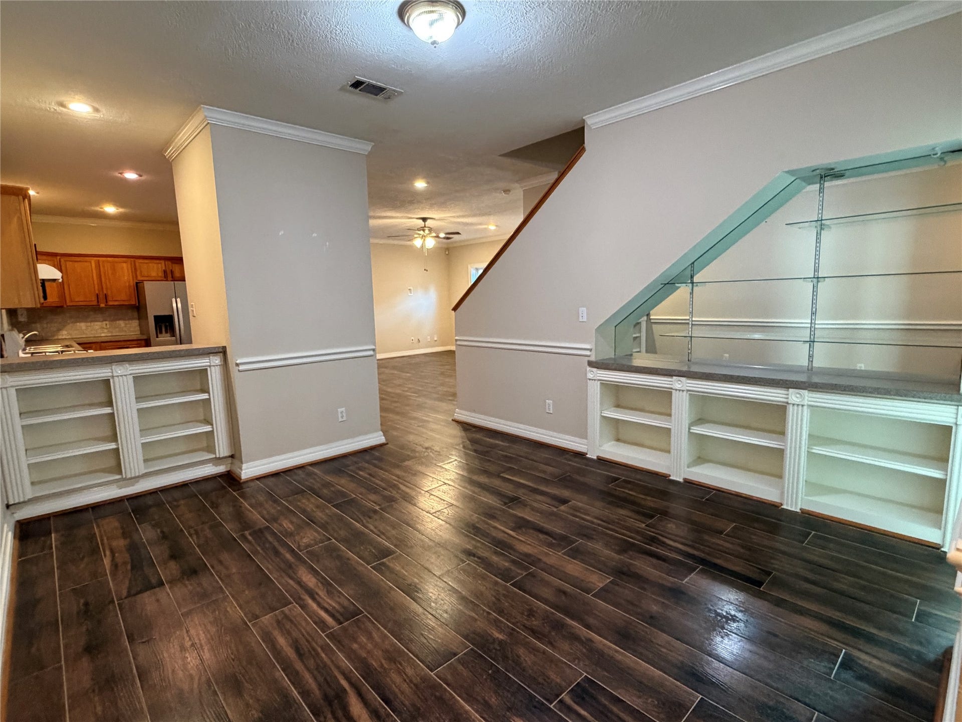 The dining room has ample built in shelves.