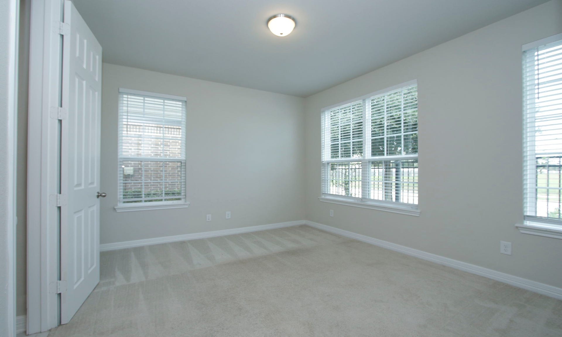 9447 Towne Lake Parkway, Cypress, TX 77433 One of two bedrooms on the first floor