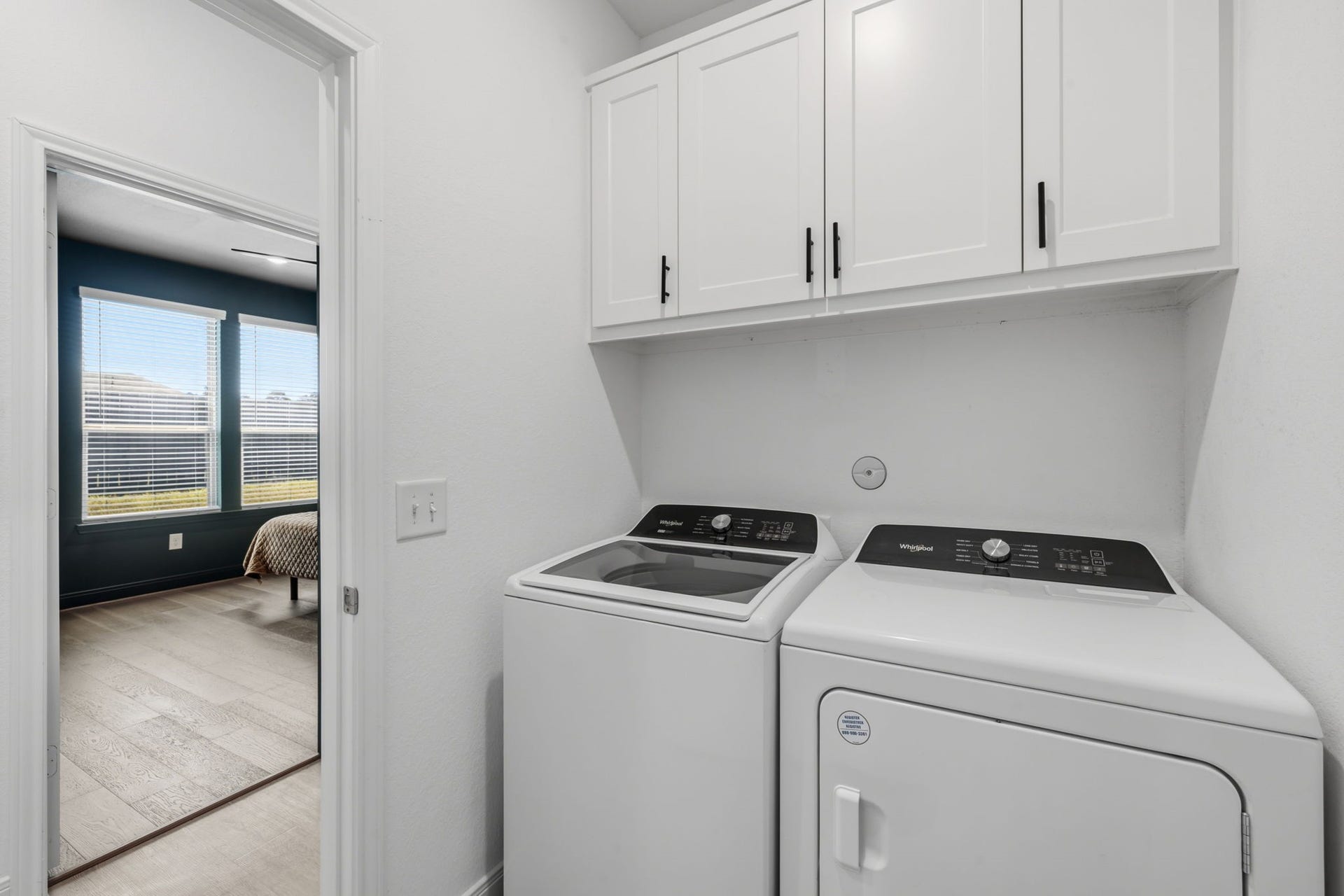 15222 Canyon Rapids Road, Conroe, TX 77302 LAUNDRY ROOM: located across from the primary bedroom