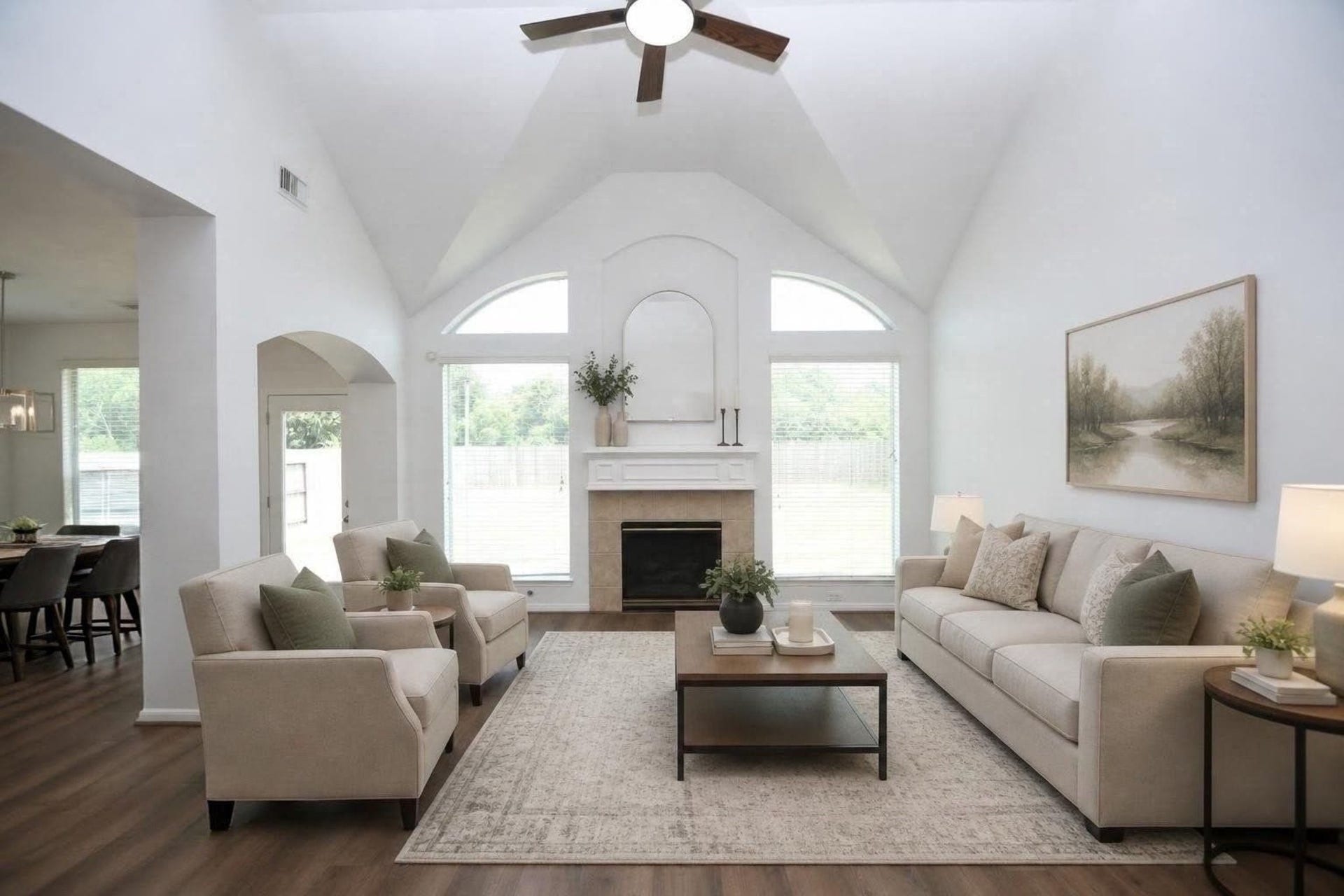 9111 Morningstar Drive, Sugar Land, TX 77479 Experience the inviting charm of this virtually staged living space, boasting high ceilings, abundant natural light, and elegant furnishings that create a perfect blend of comfort and sophistication.