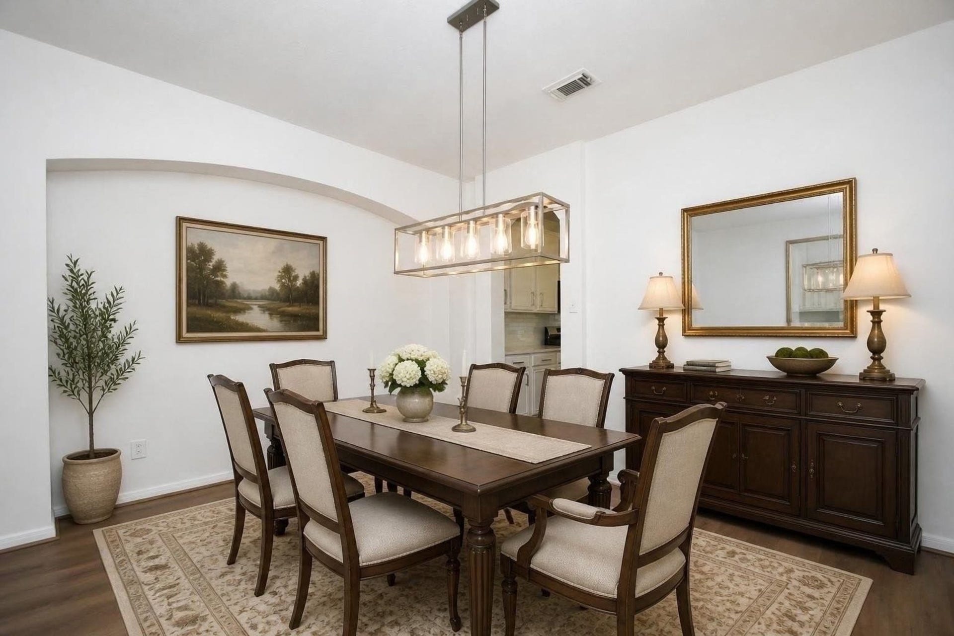 9111 Morningstar Drive, Sugar Land, TX 77479 Experience the elegance of this virtually staged dining room, showcasing sophisticated furniture and decor that perfectly complements the classic charm of the space.