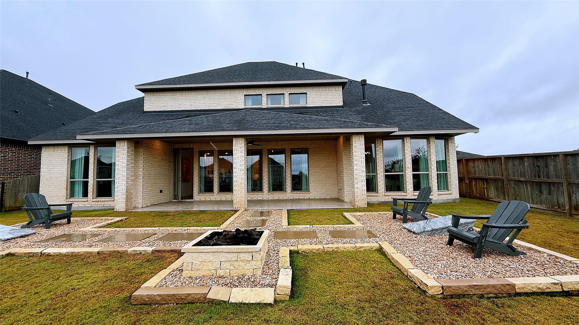 5603 Logan Ridge Lane, Fulshear, TX 77441 Cornhole boards and seats included with the property!