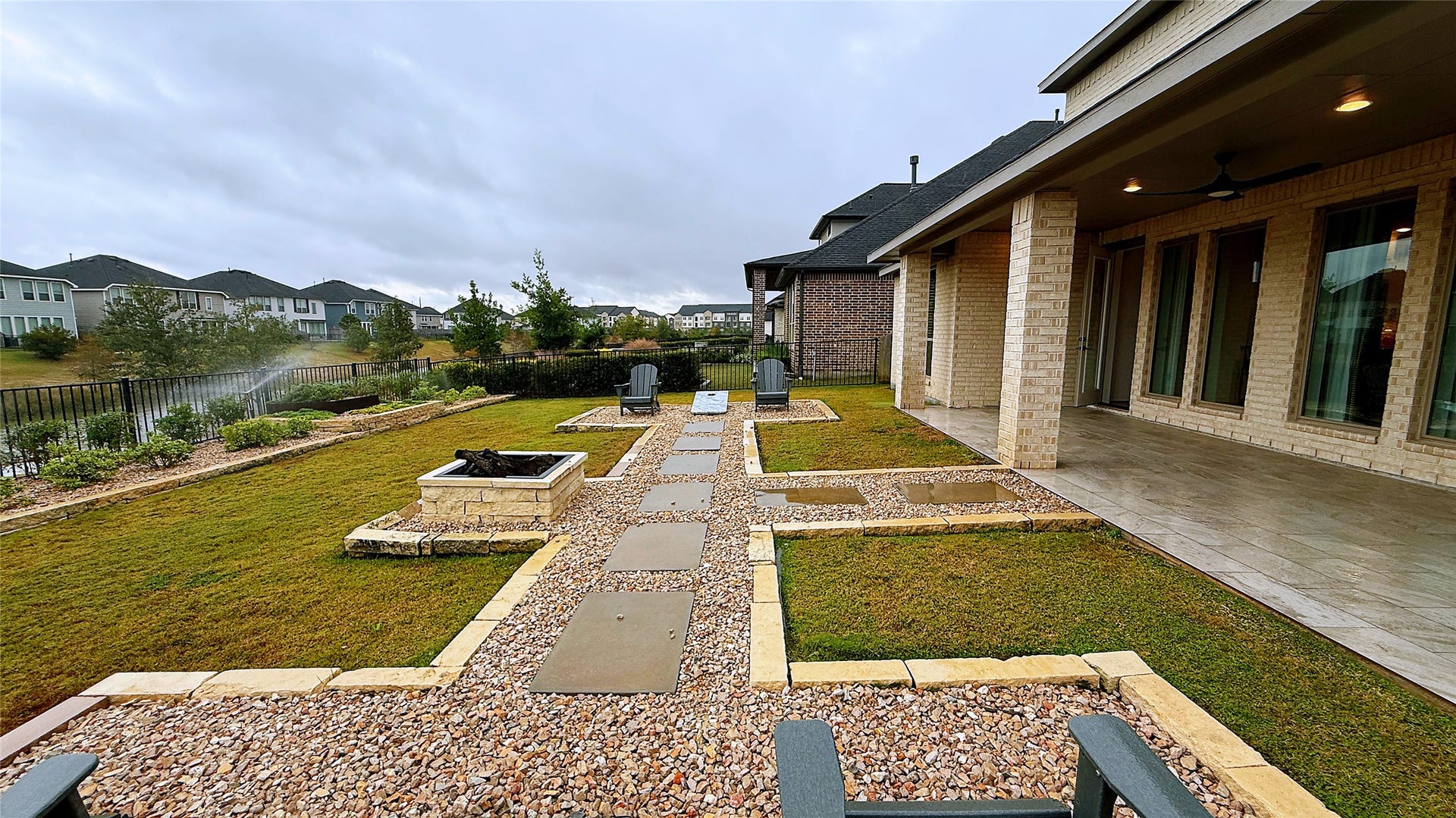 5603 Logan Ridge Lane, Fulshear, TX 77441 Cornhole boards and seats included with the property!