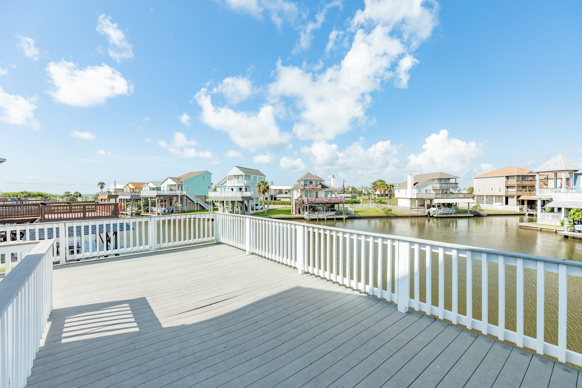 325 Admiral Circle, Tiki Island, TX 77554 Decked area over the boat slip.
