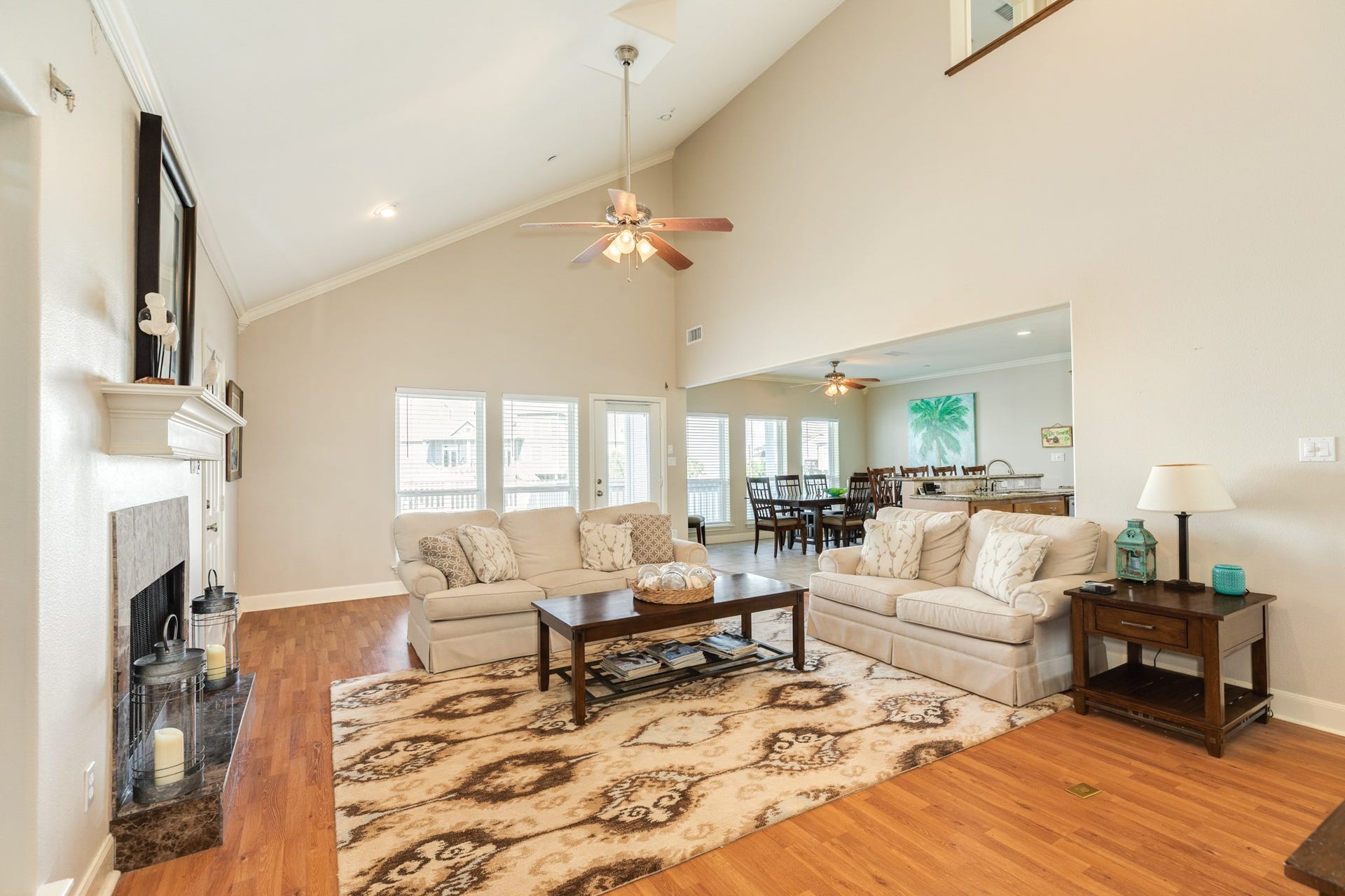325 Admiral Circle, Tiki Island, TX 77554 Dining area and kitchen are close by to the living room.