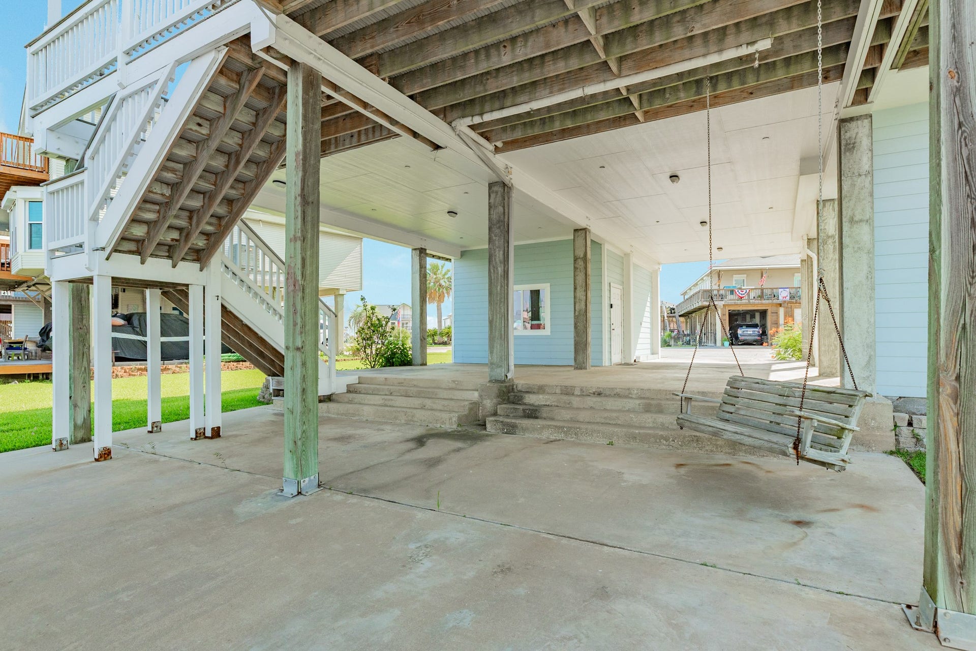 325 Admiral Circle, Tiki Island, TX 77554 View through the patio area looking towards Admiral Circle.