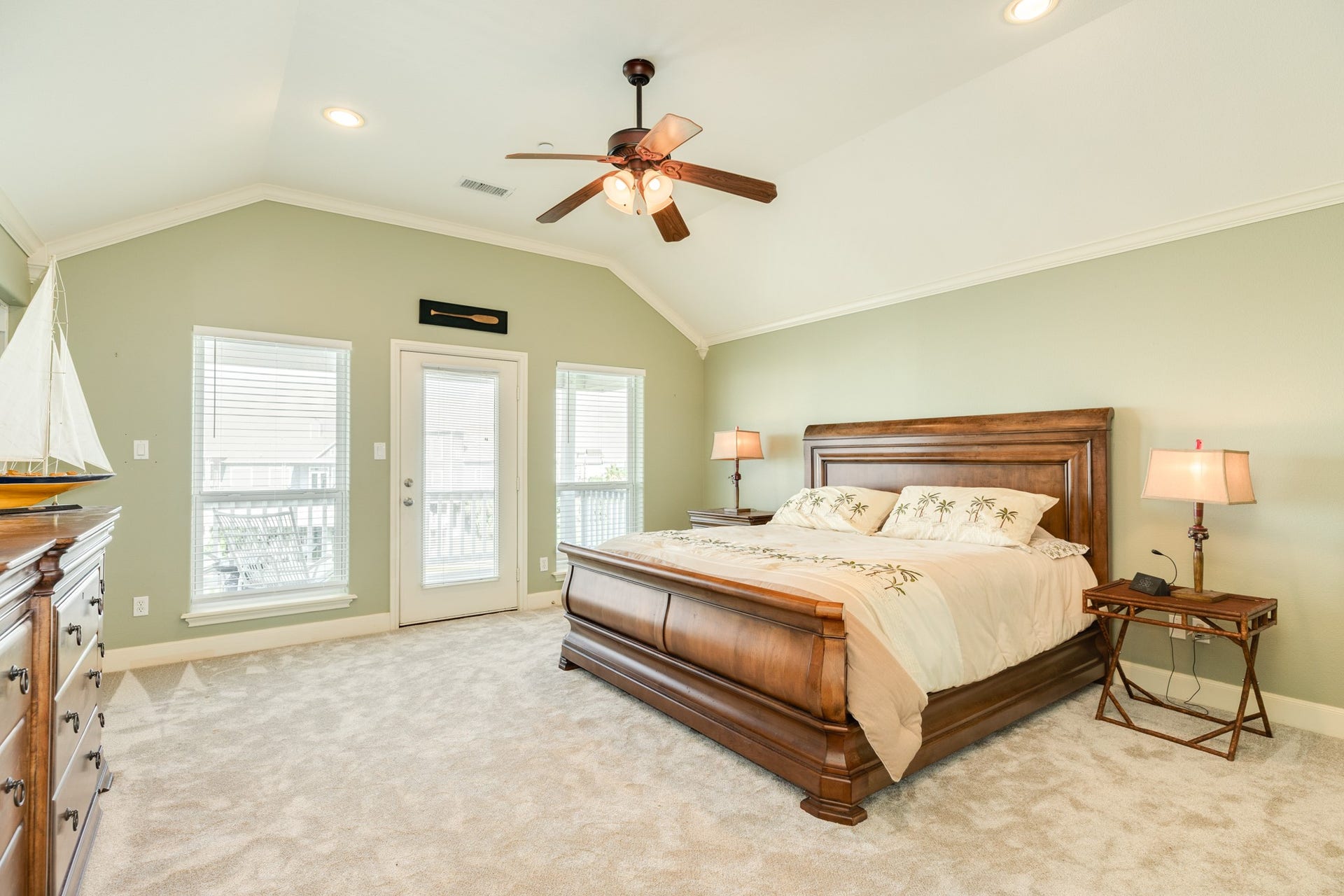 325 Admiral Circle, Tiki Island, TX 77554 Primary bedroom with private deck.