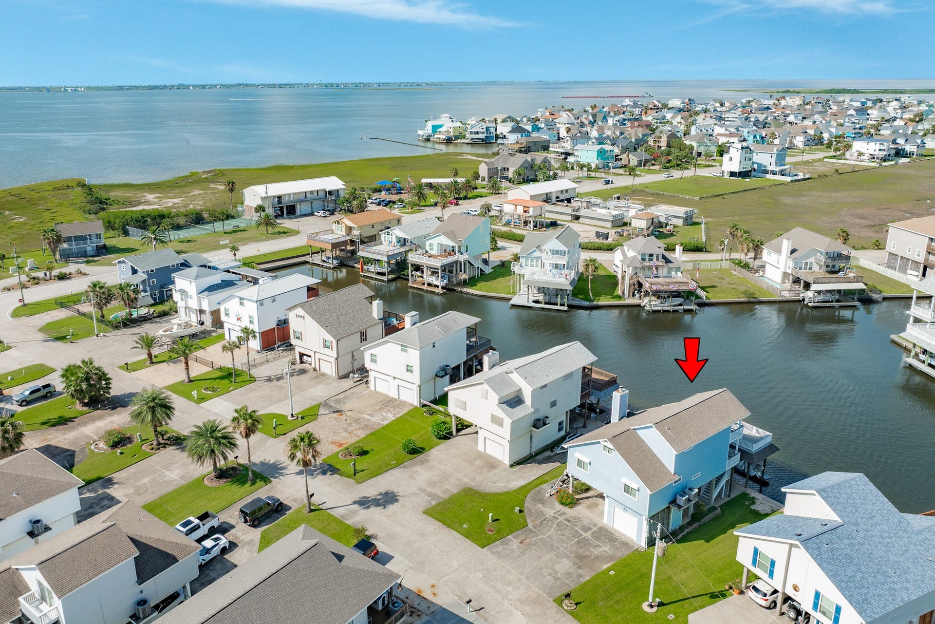 325 Admiral Circle, Tiki Island, TX 77554 Aerial view of the Tiki Island Yacht Club Colony Section 1.