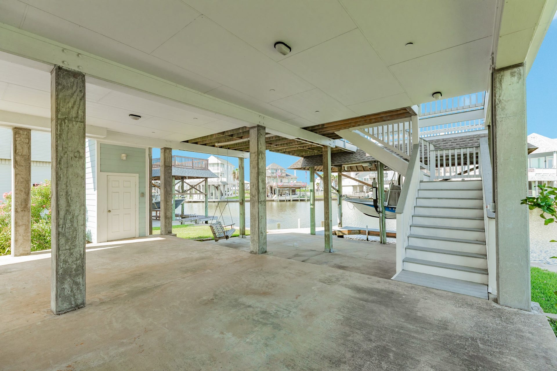 325 Admiral Circle, Tiki Island, TX 77554 The door in view to the left, is the Elevator shaft with fully operational Inclinator Elevator.