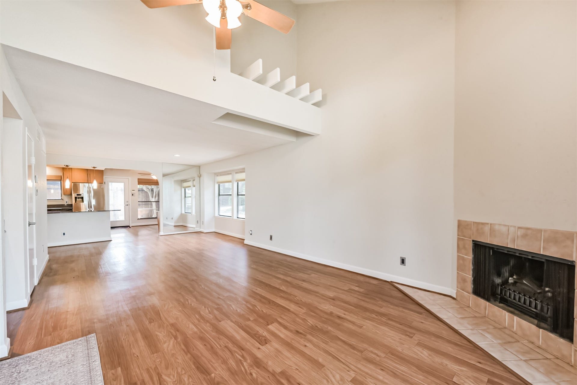 View from front door to the open and updated kitchen.